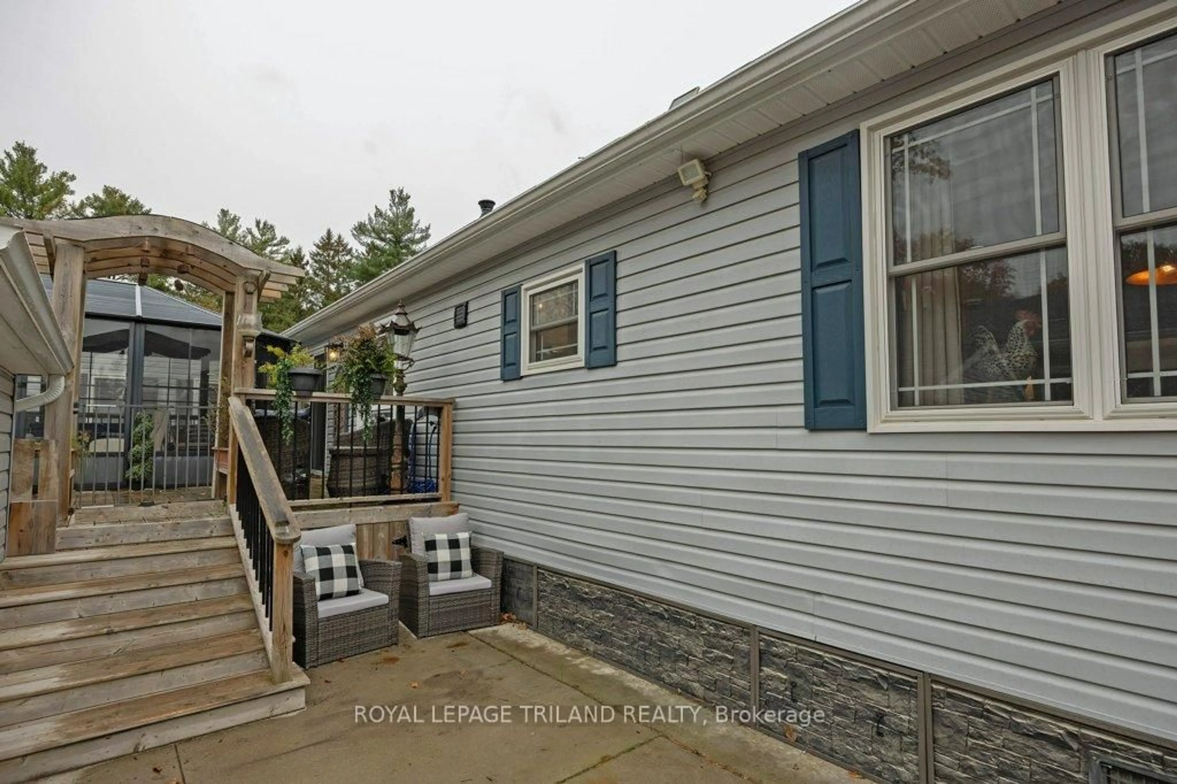 Home with vinyl exterior material, street for 22790 AMIENS Rd #130, Middlesex Centre Ontario N0L 1R0