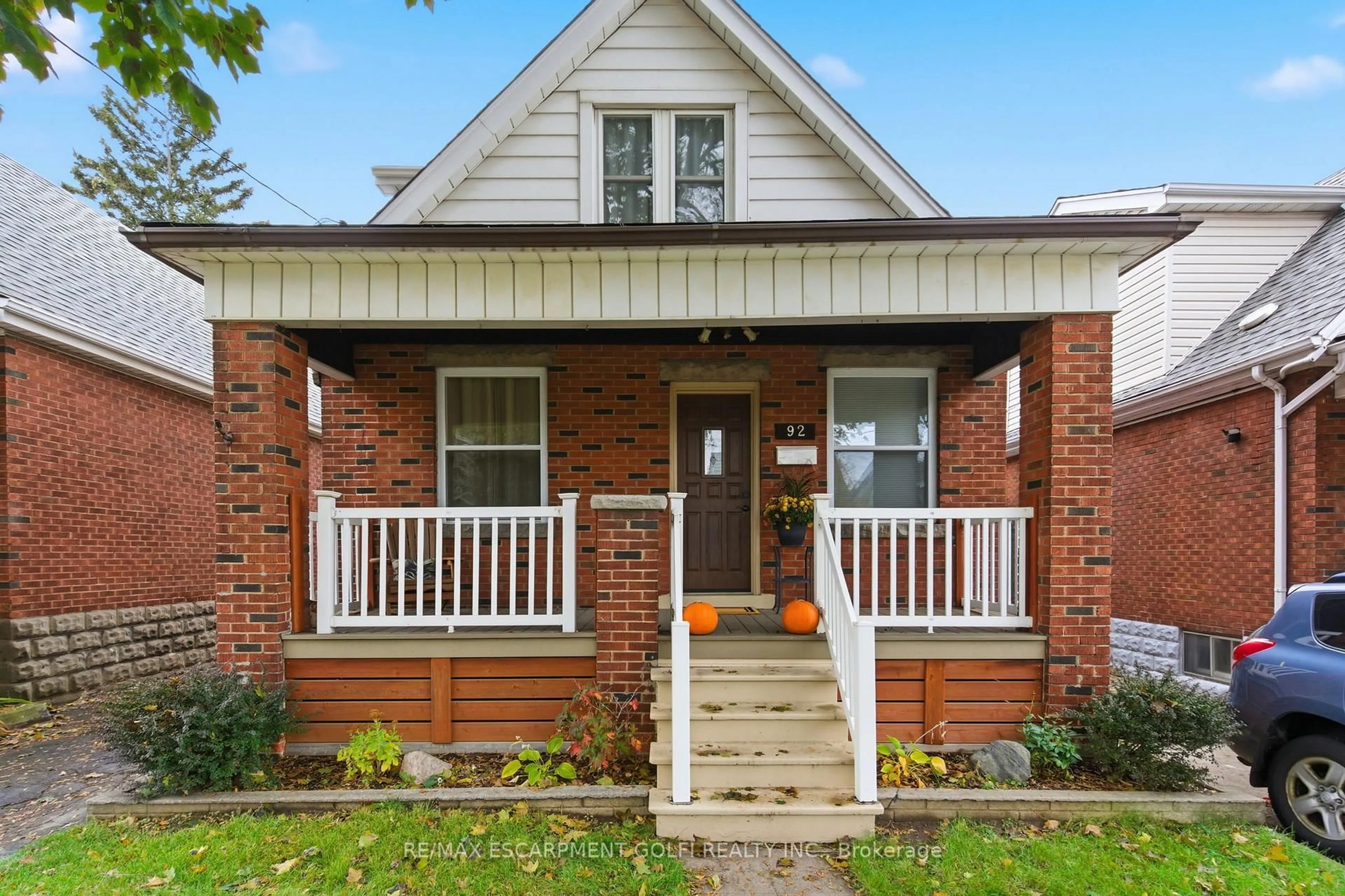 Home with brick exterior material, street for 92 Huxley Ave, Hamilton Ontario L8K 2P8