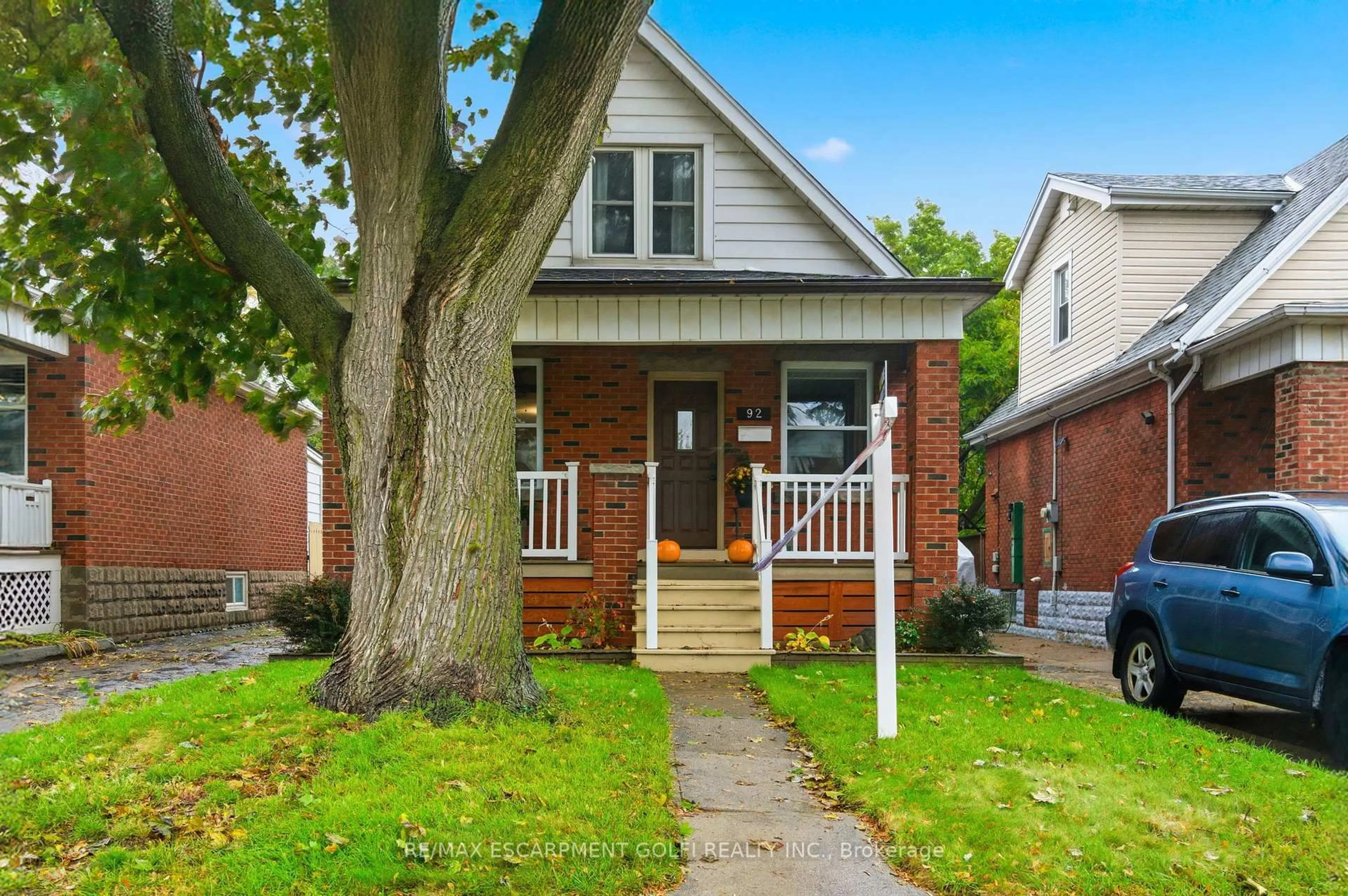 Home with brick exterior material, street for 92 Huxley Ave, Hamilton Ontario L8K 2P8