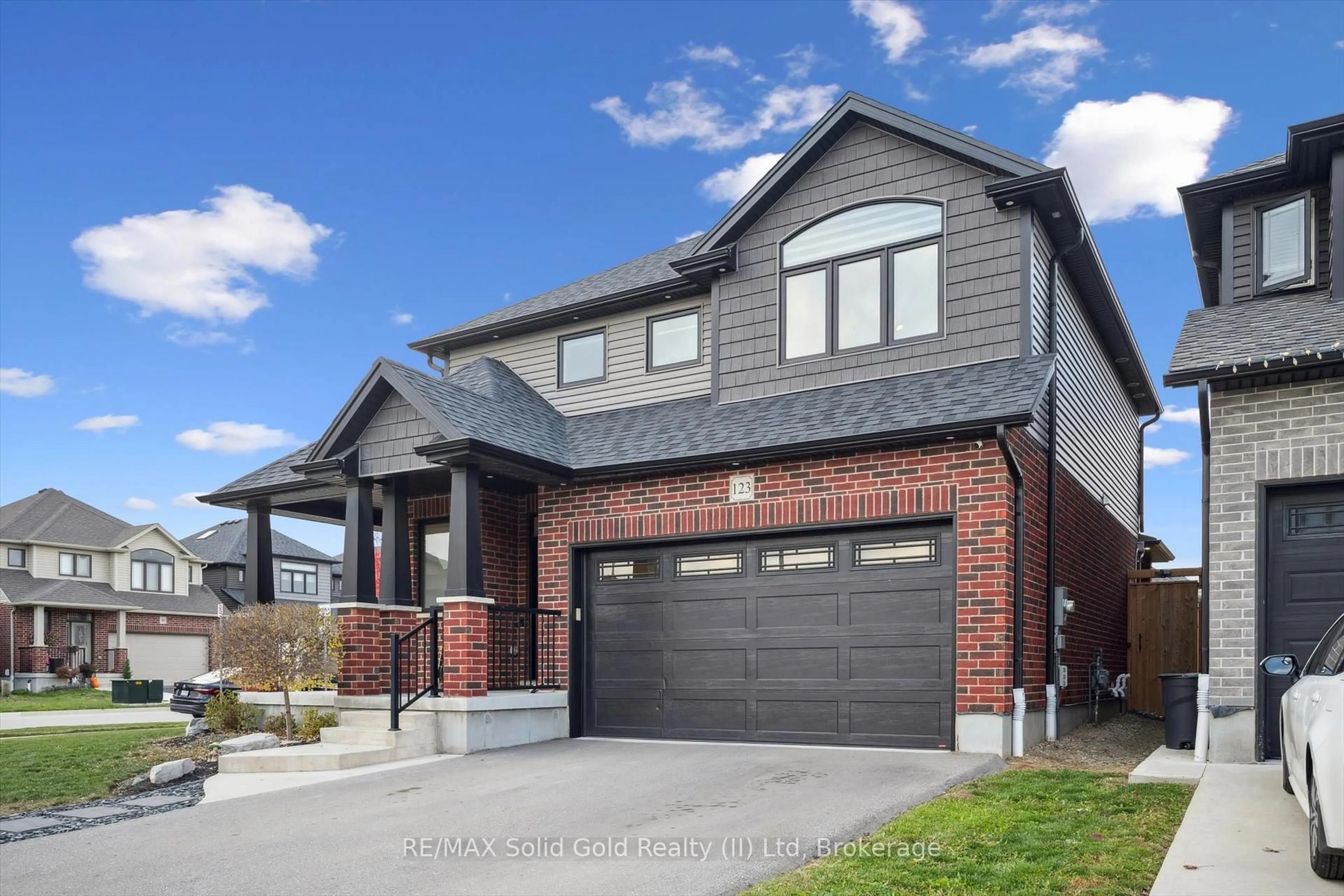 Home with brick exterior material, street for 123 Tristan Cres, Woolwich Ontario N0B 1M0