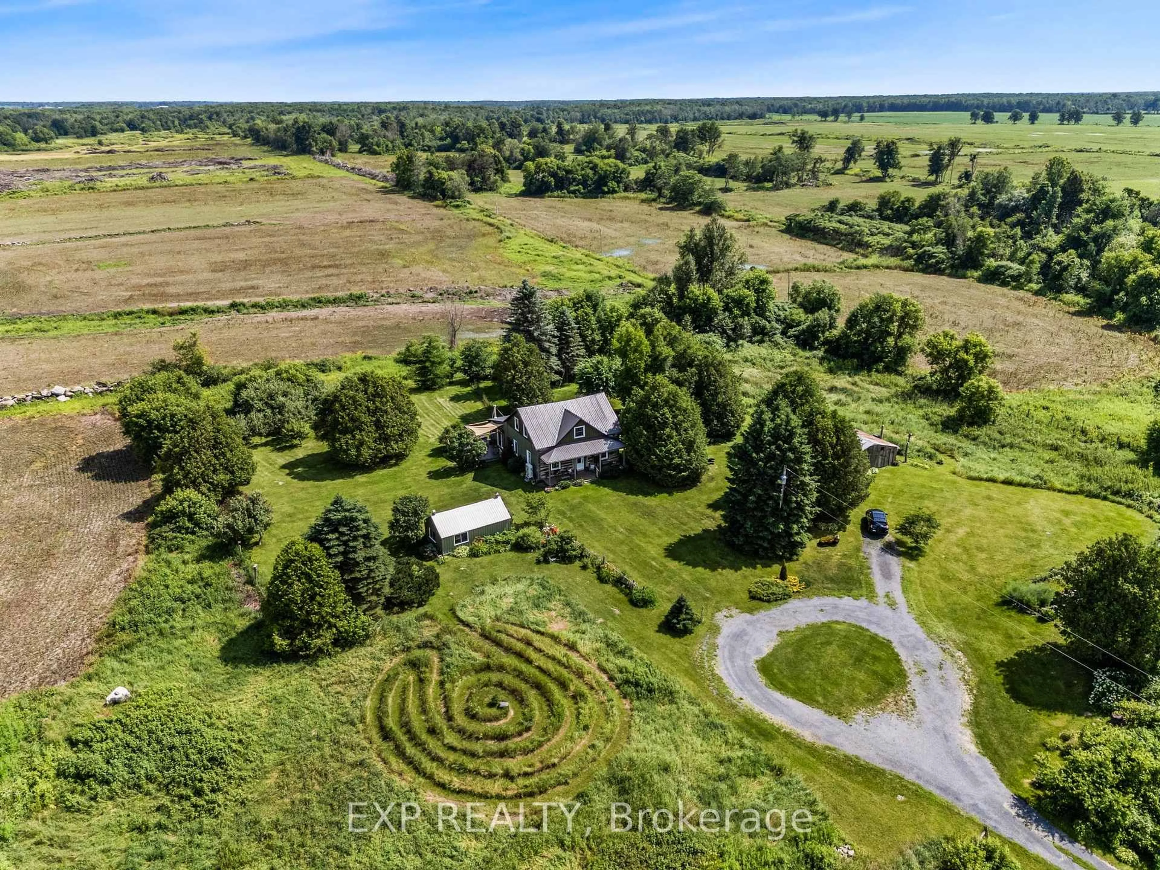 A pic from outside/outdoor area/front of a property/back of a property/a pic from drone, unknown for 20612 Laggan Glenelg Rd, North Glengarry Ontario K0B 1E0
