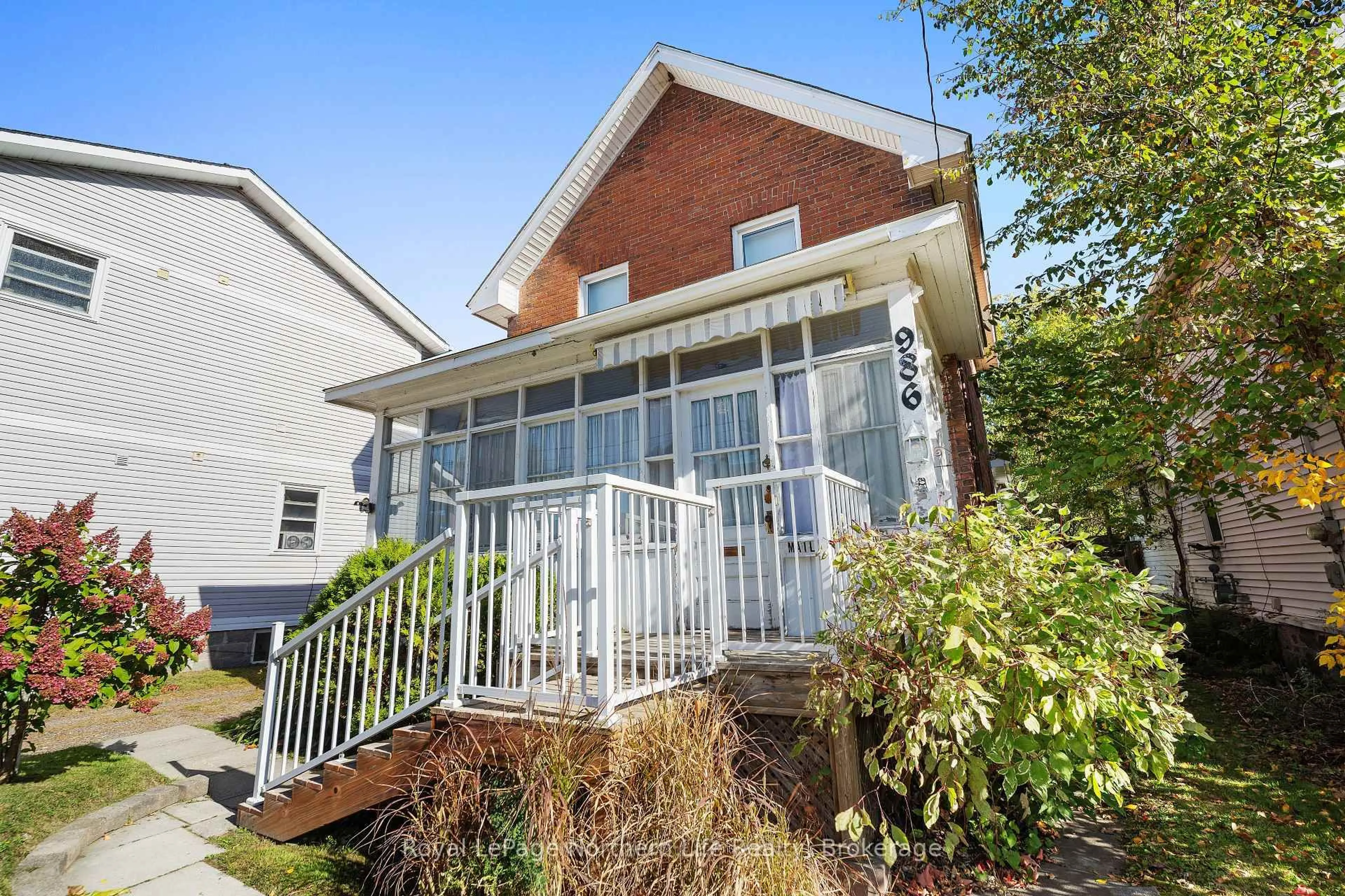 Home with brick exterior material, street for 986 Main St, North Bay Ontario P1B 2W1