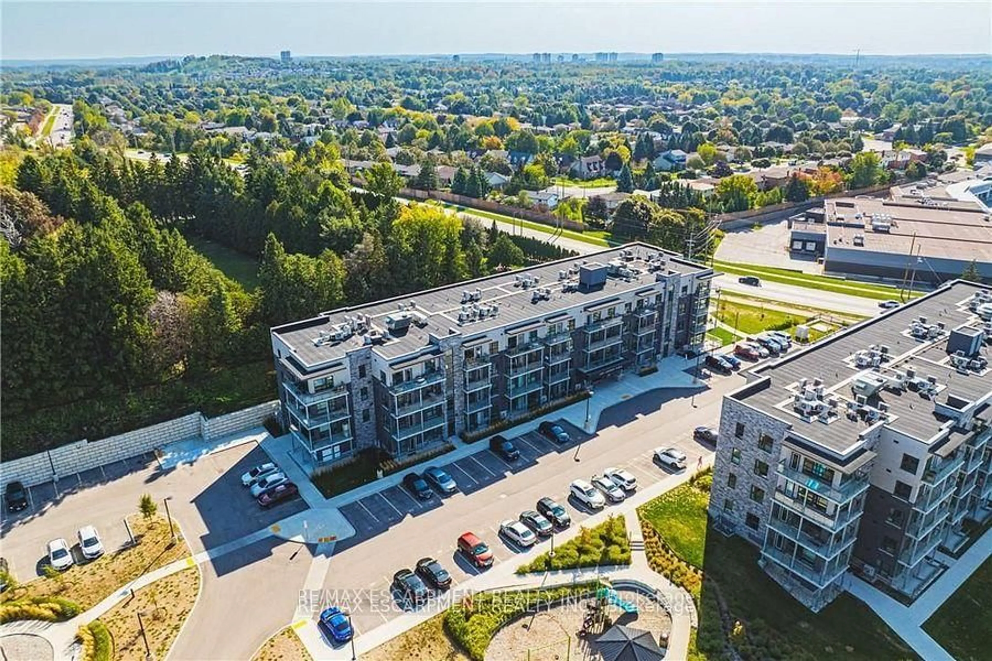 A pic from outside/outdoor area/front of a property/back of a property/a pic from drone, city buildings view from balcony for 1201 Lackner Pl #310, Kitchener Ontario N2A 0L4