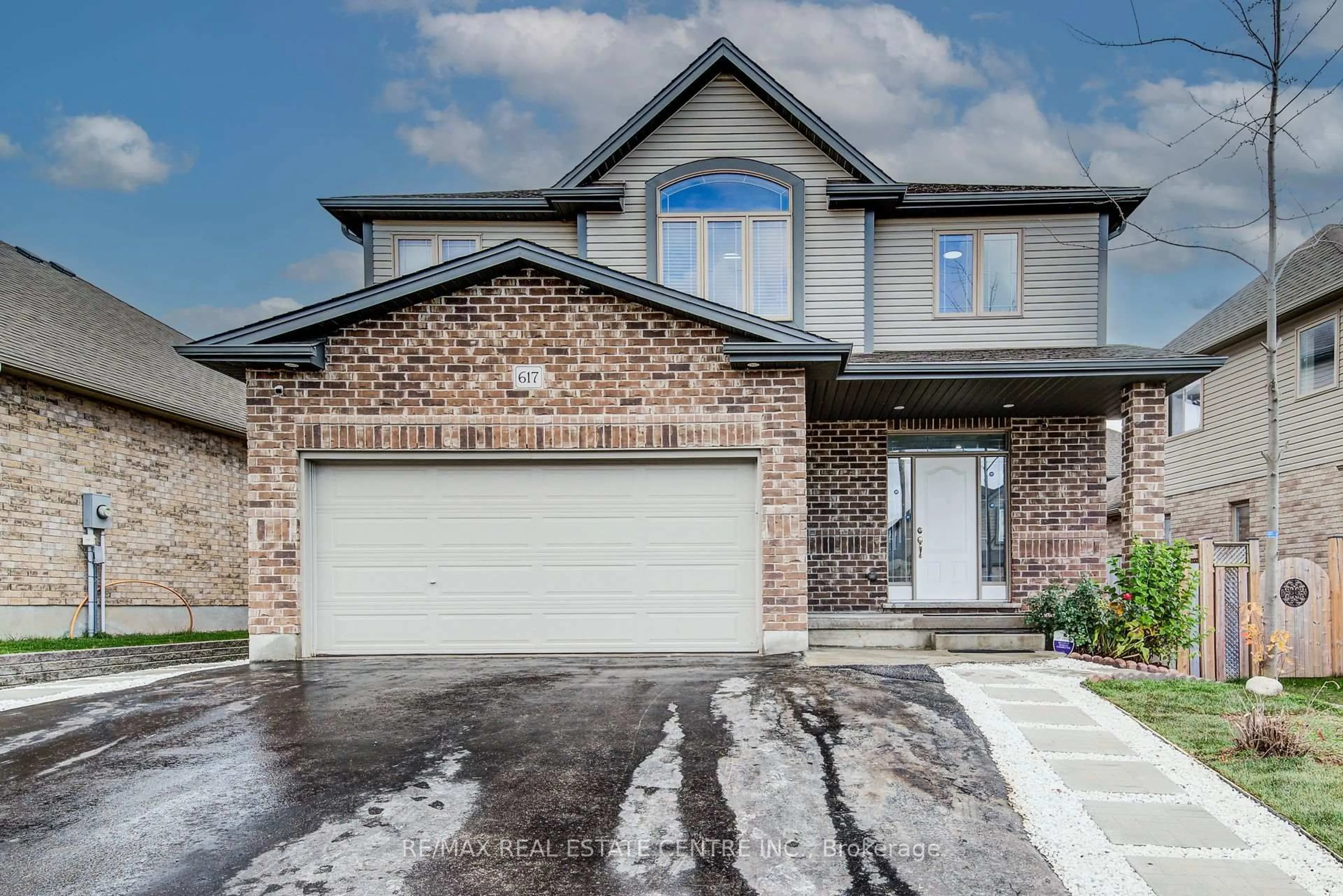 Home with brick exterior material, street for 617 Thorndale Dr, Waterloo Ontario N2T 0A9
