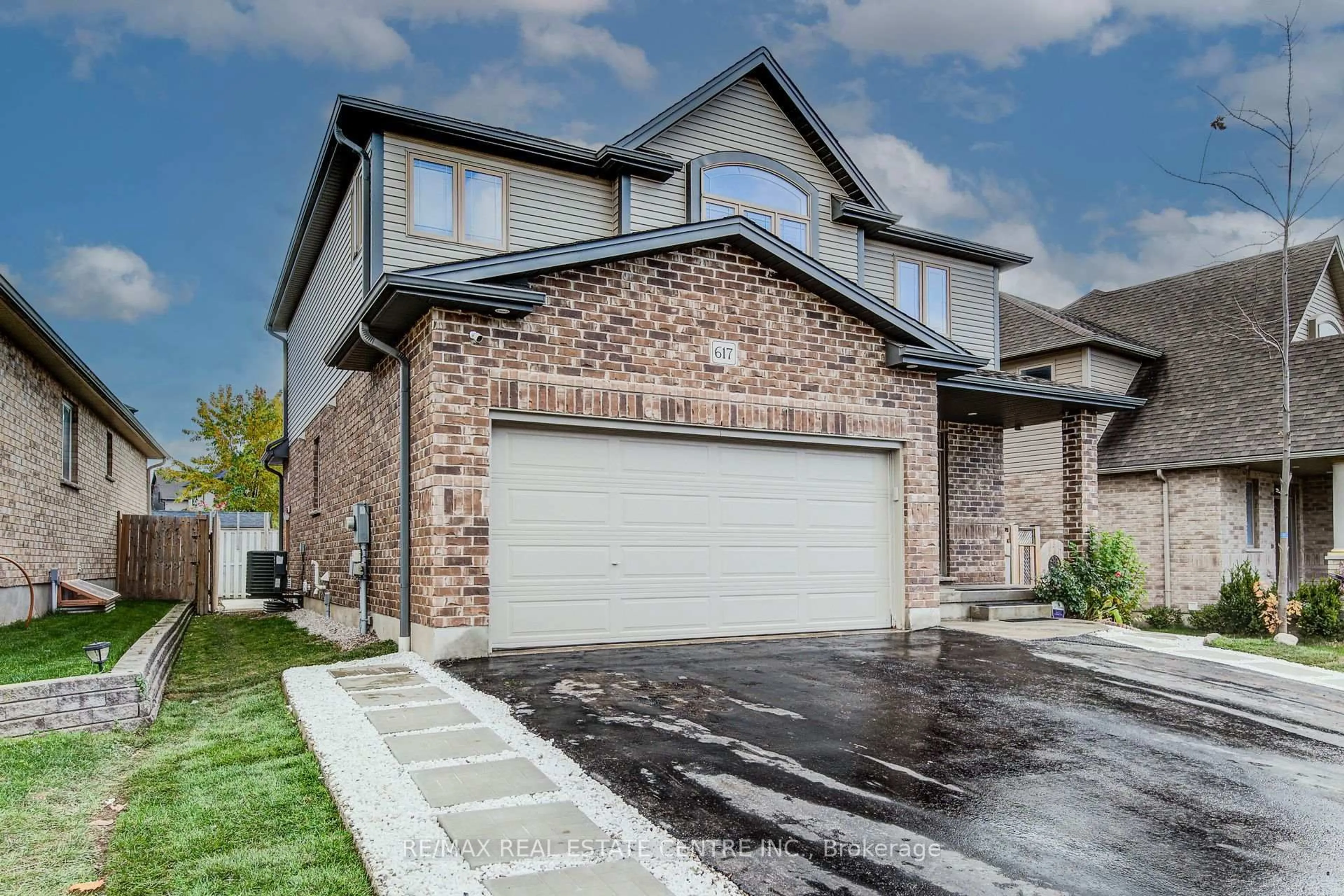 Home with brick exterior material, street for 617 Thorndale Dr, Waterloo Ontario N2T 0A9