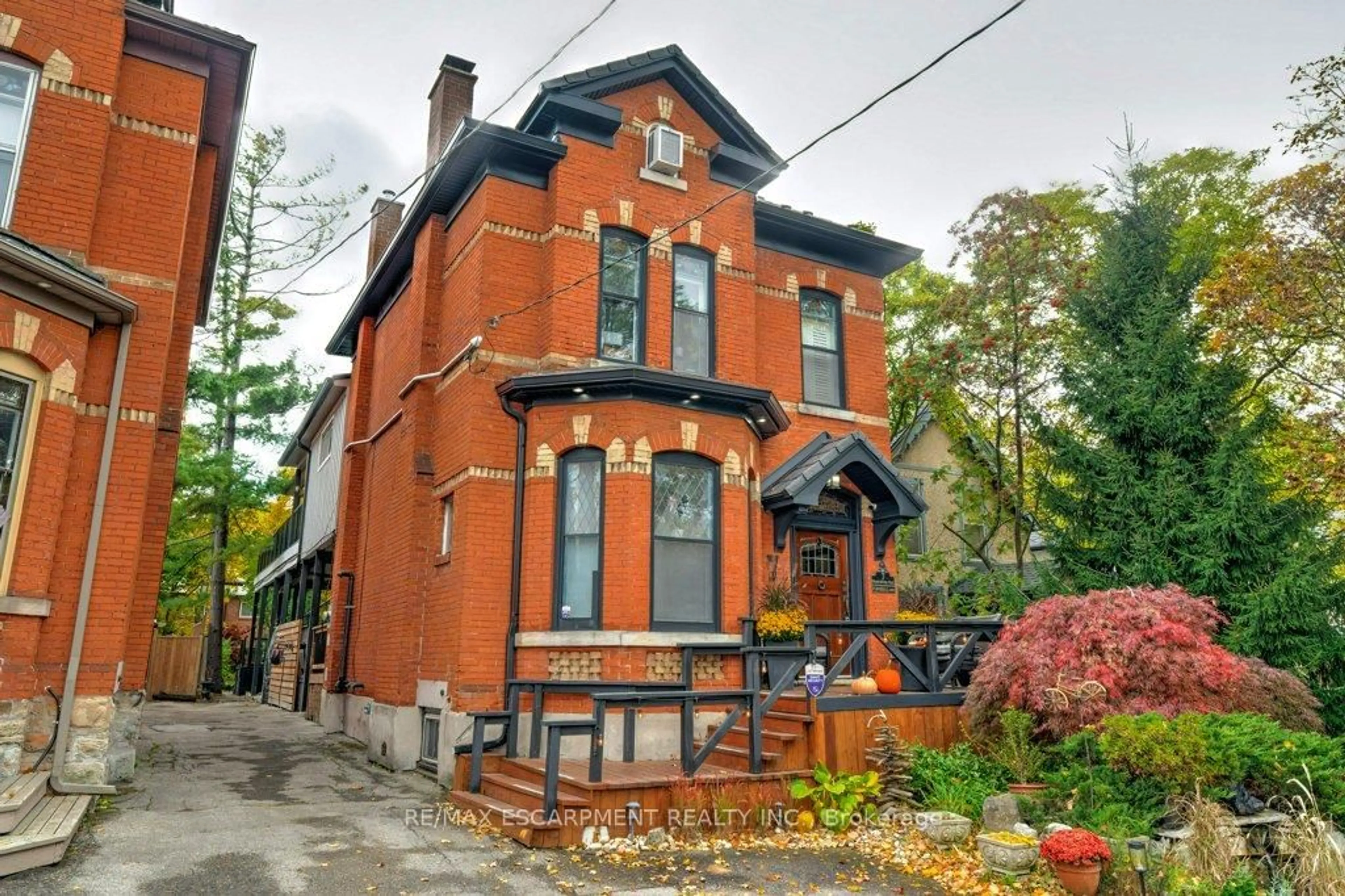 Home with brick exterior material, street for 7 Homewood Ave, Hamilton Ontario L8P 2M1