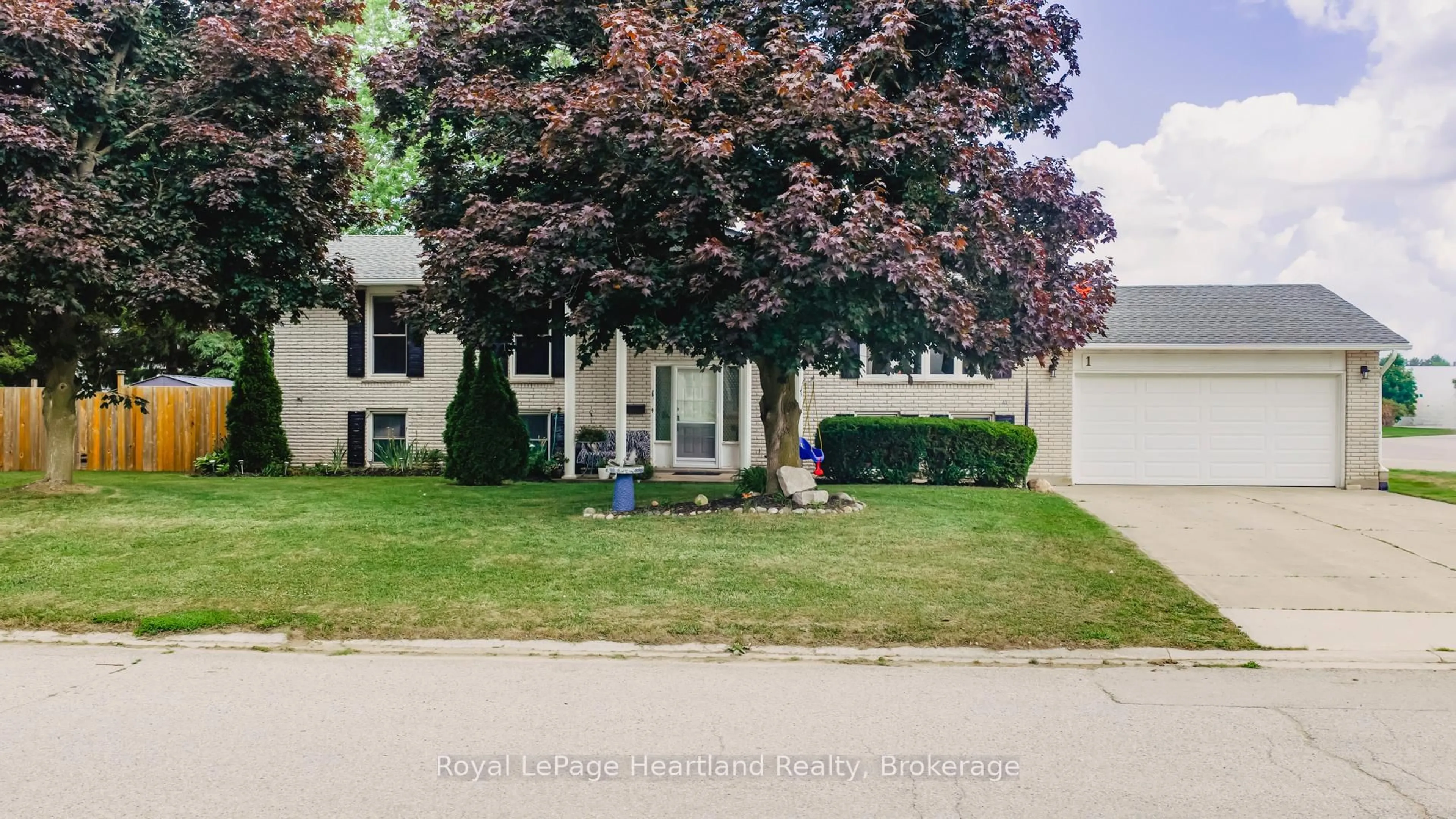 Home with vinyl exterior material, street for 1 Alexander St, Huron East Ontario N0K 1W0