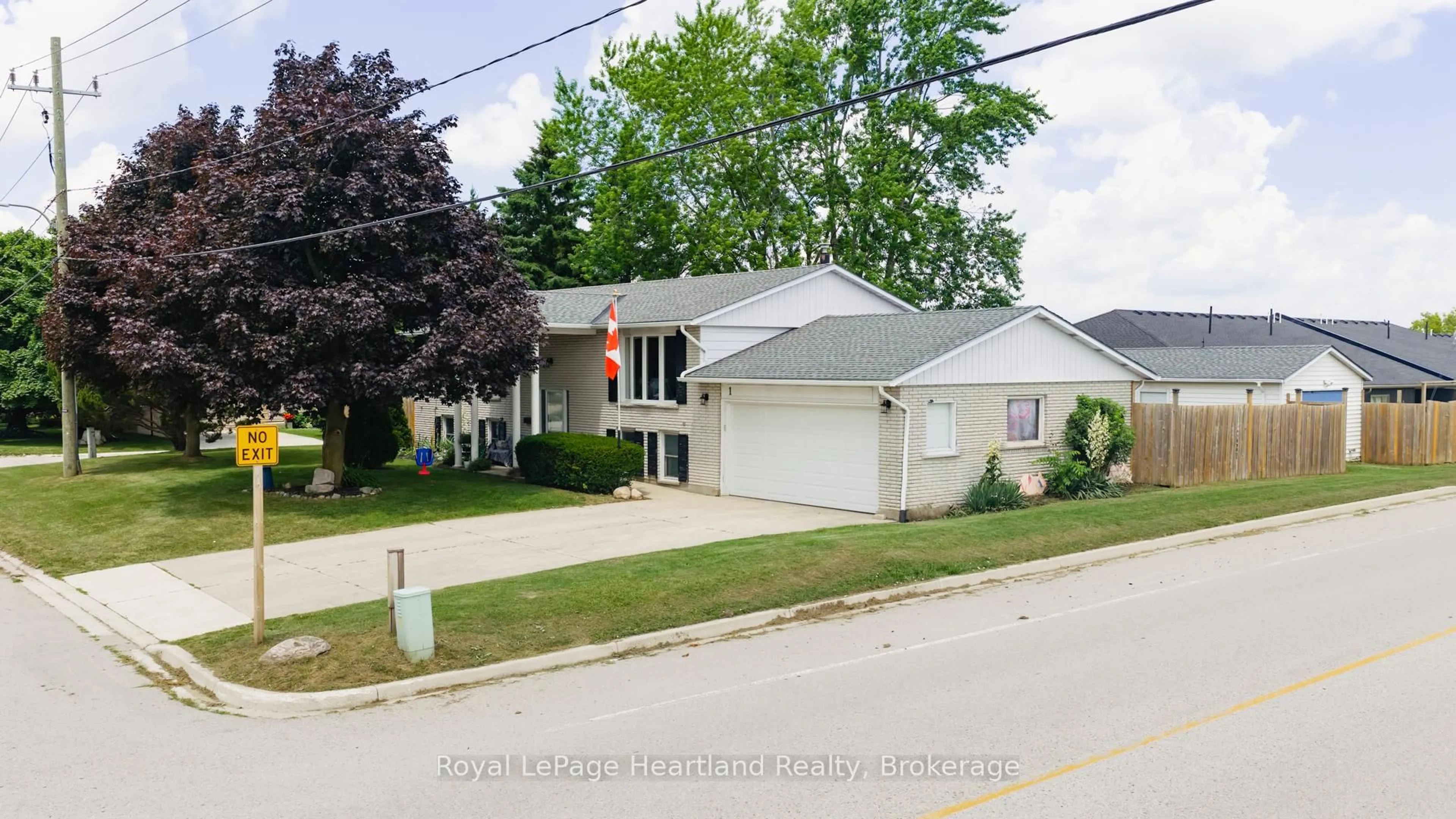 A pic from outside/outdoor area/front of a property/back of a property/a pic from drone, street for 1 Alexander St, Huron East Ontario N0K 1W0