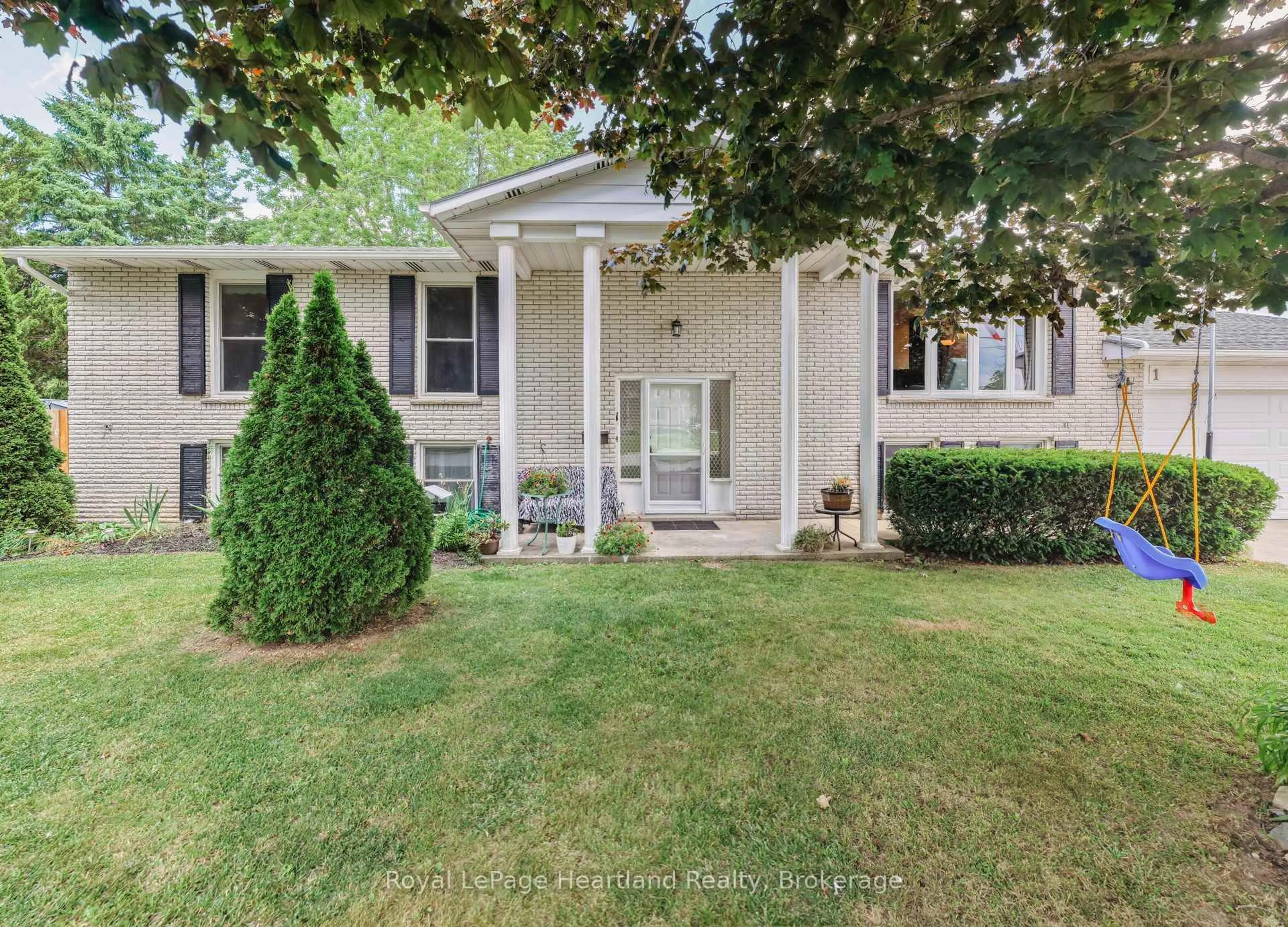 Home with vinyl exterior material, street for 1 Alexander St, Huron East Ontario N0K 1W0