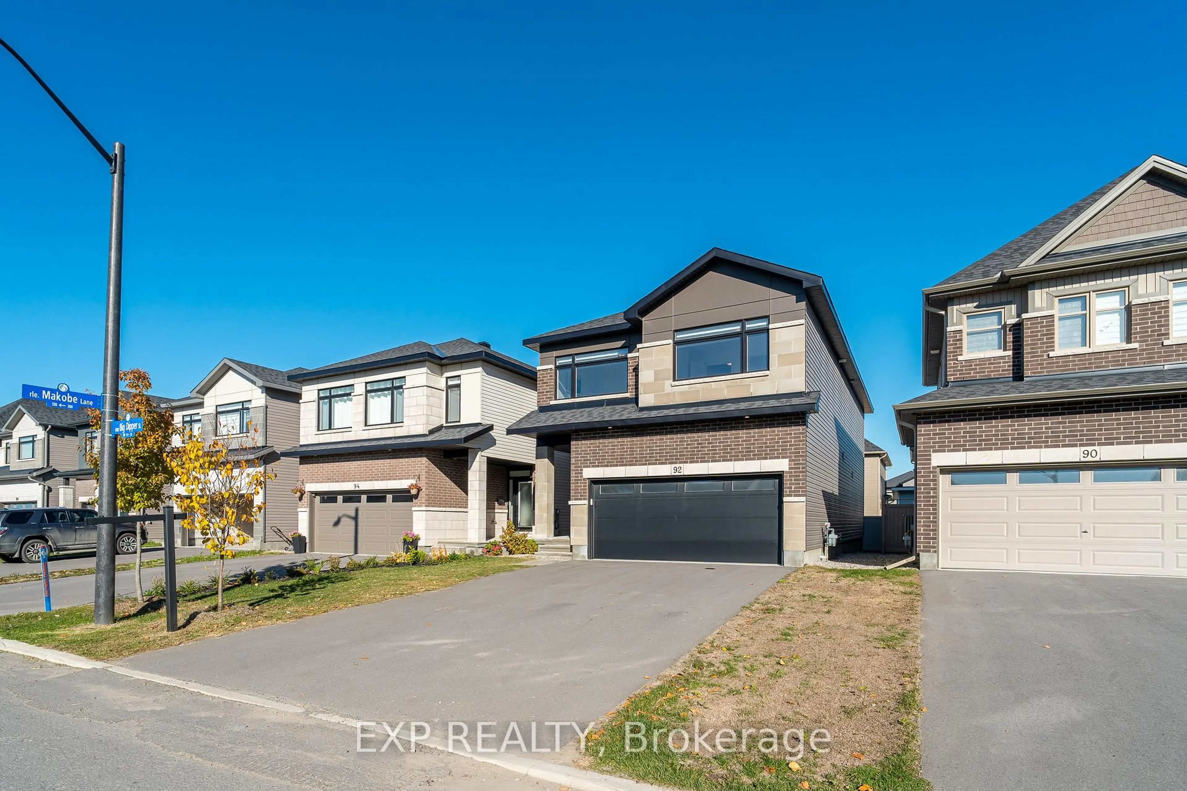 A pic from outside/outdoor area/front of a property/back of a property/a pic from drone, street for 92 Big Dipper St, Ottawa Ontario K4M 0L9