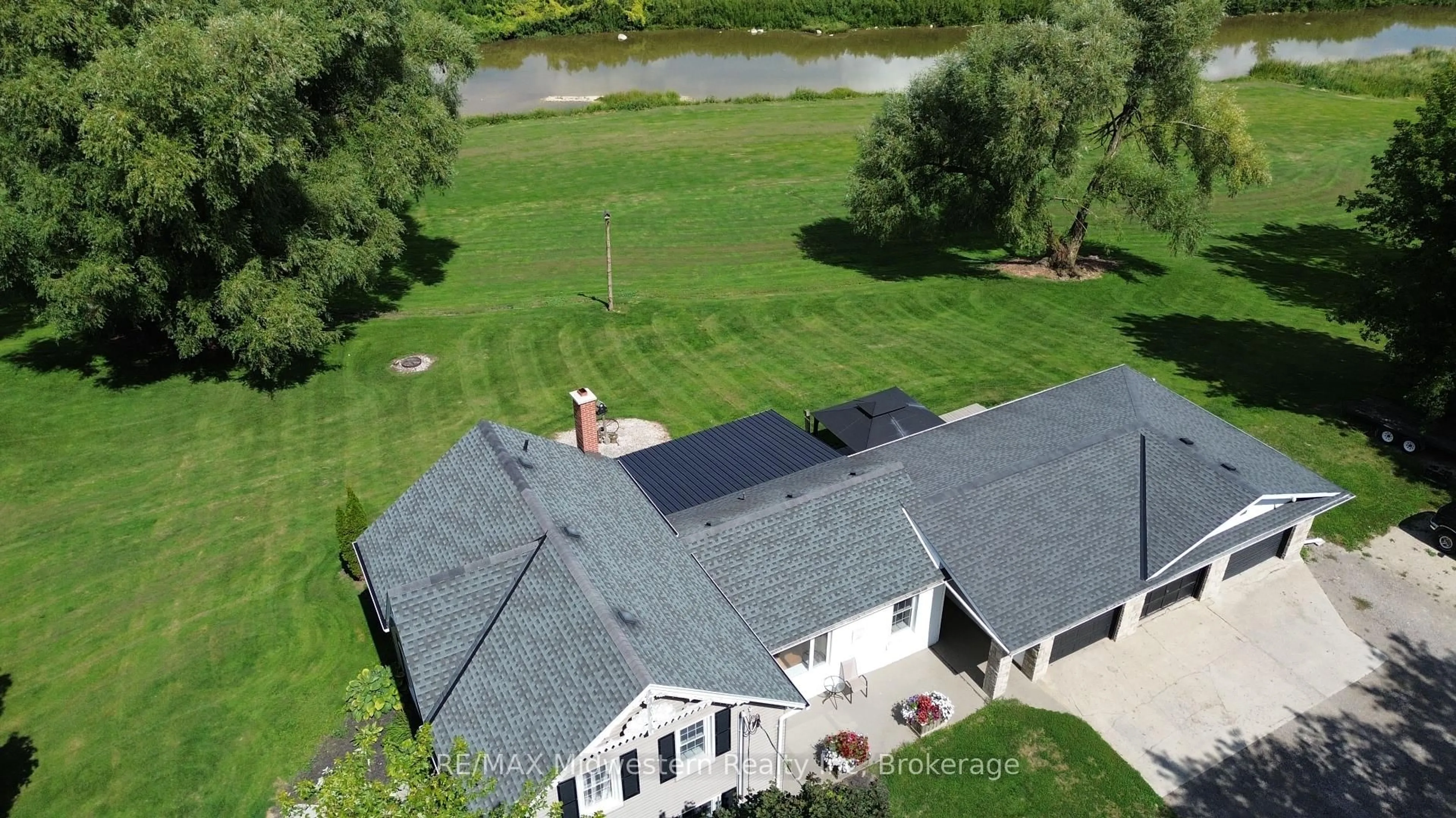 A pic from outside/outdoor area/front of a property/back of a property/a pic from drone, water/lake/river/ocean view for 2081 John St, Howick Ontario N0G 1X0