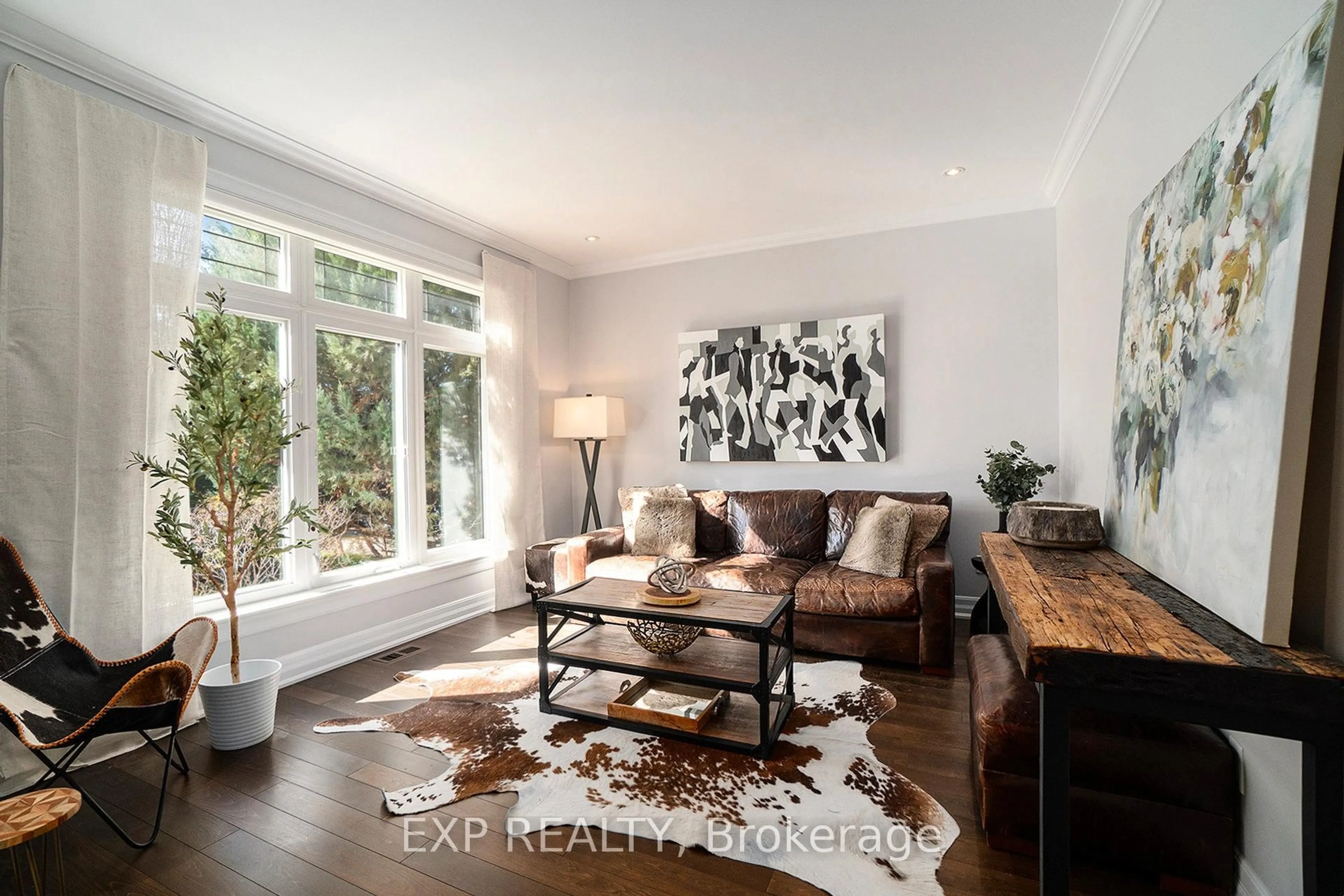 Living room with furniture, wood/laminate floor for 450 Lockmaster Cres, Ottawa Ontario K4M 1L9