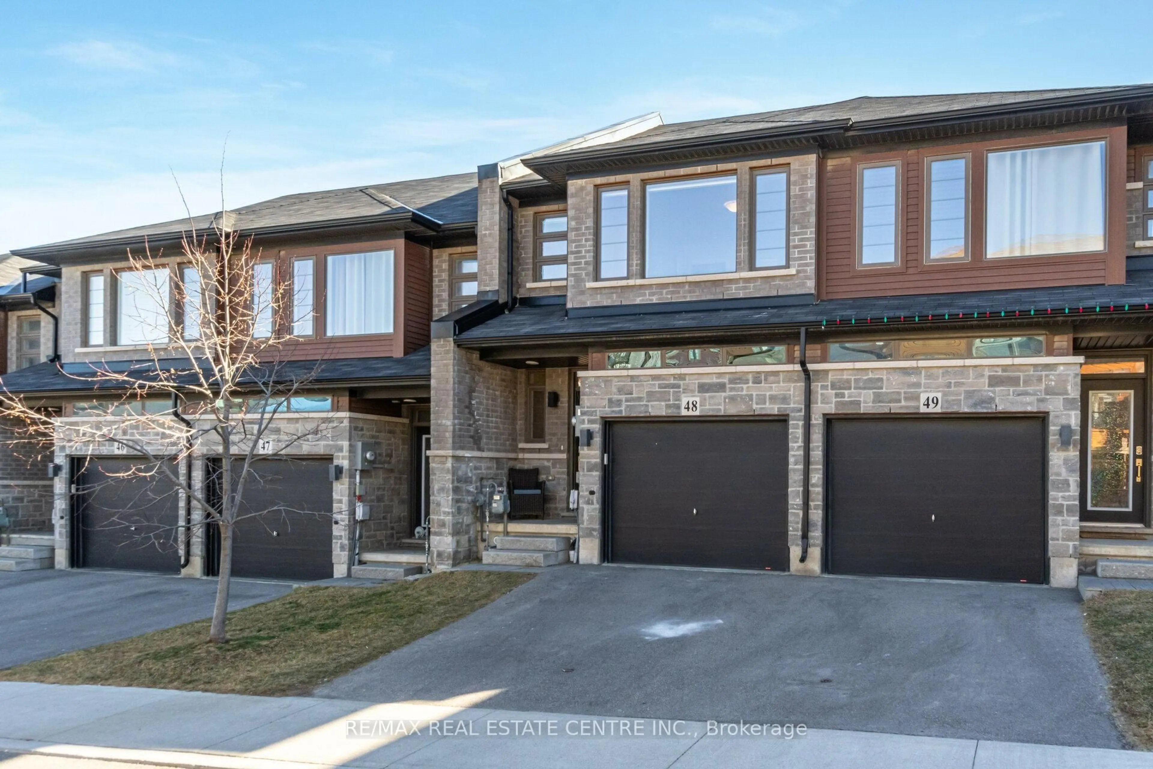 Home with brick exterior material, street for 30 Times Square Blvd #48, Hamilton Ontario L8J 0L8