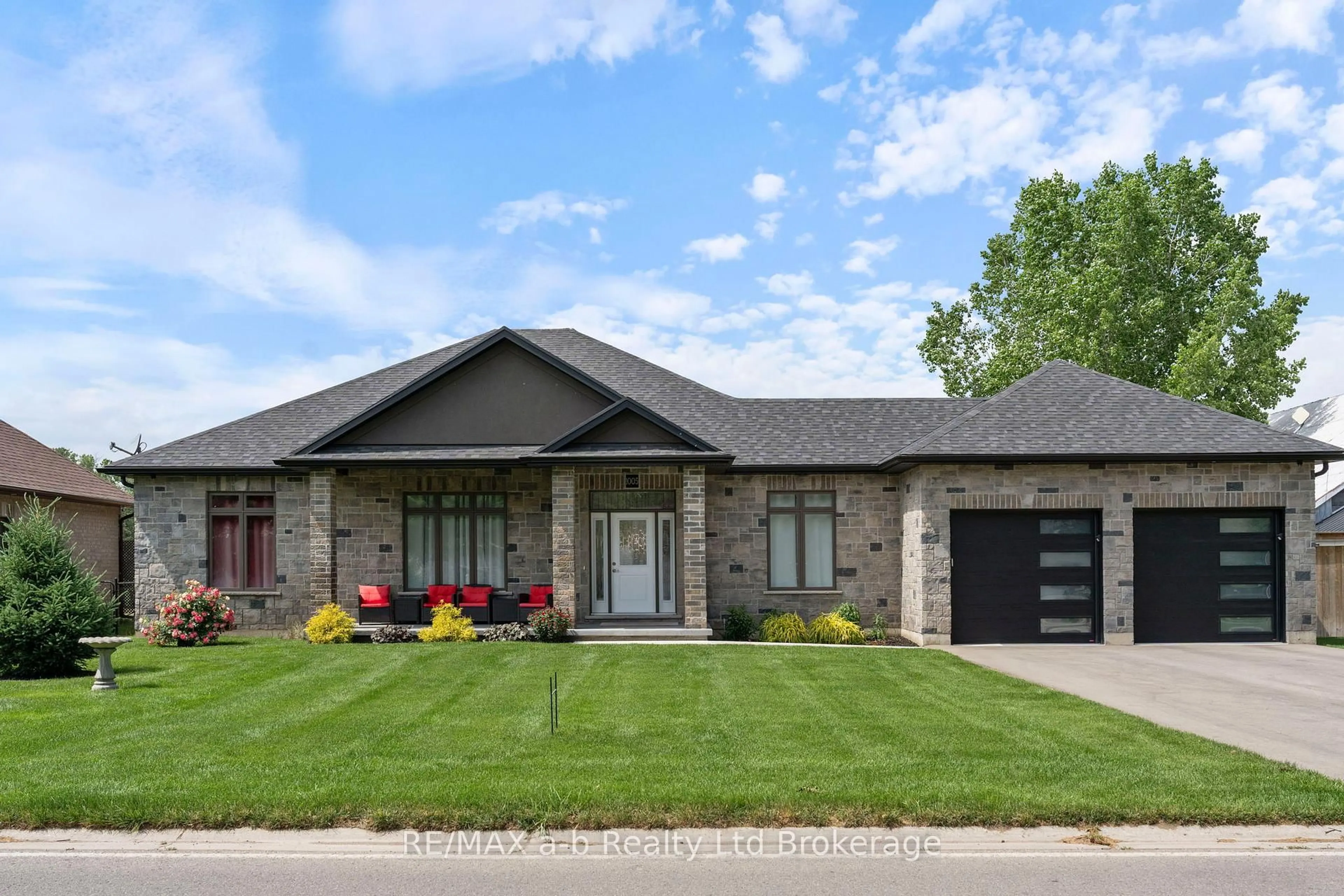 Home with brick exterior material, street for 1005 Windham Centre Rd, Norfolk Ontario N0E 2A0