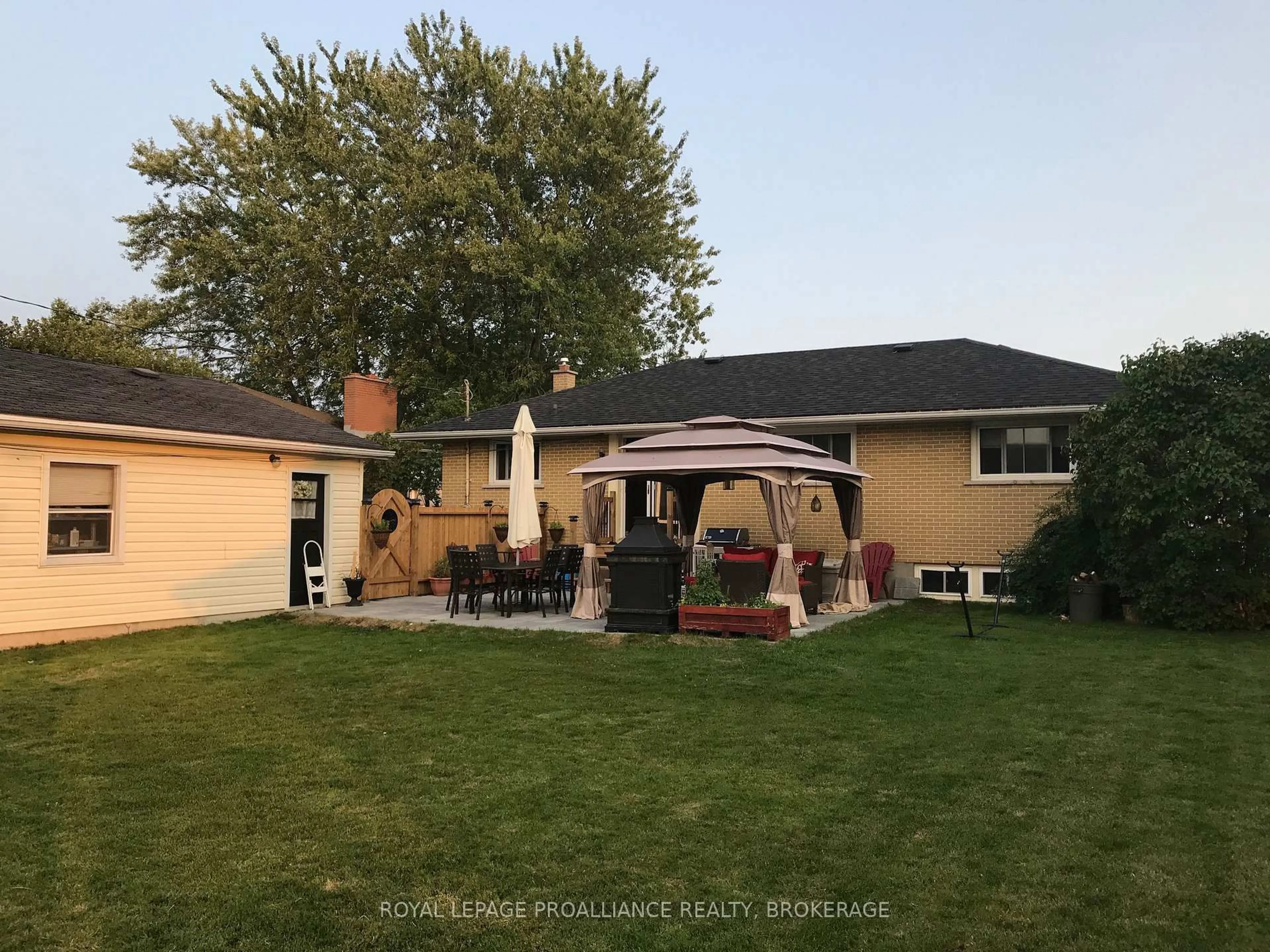 A pic from outside/outdoor area/front of a property/back of a property/a pic from drone, street for 70 Briscoe St, Loyalist Ontario K7N 1G1