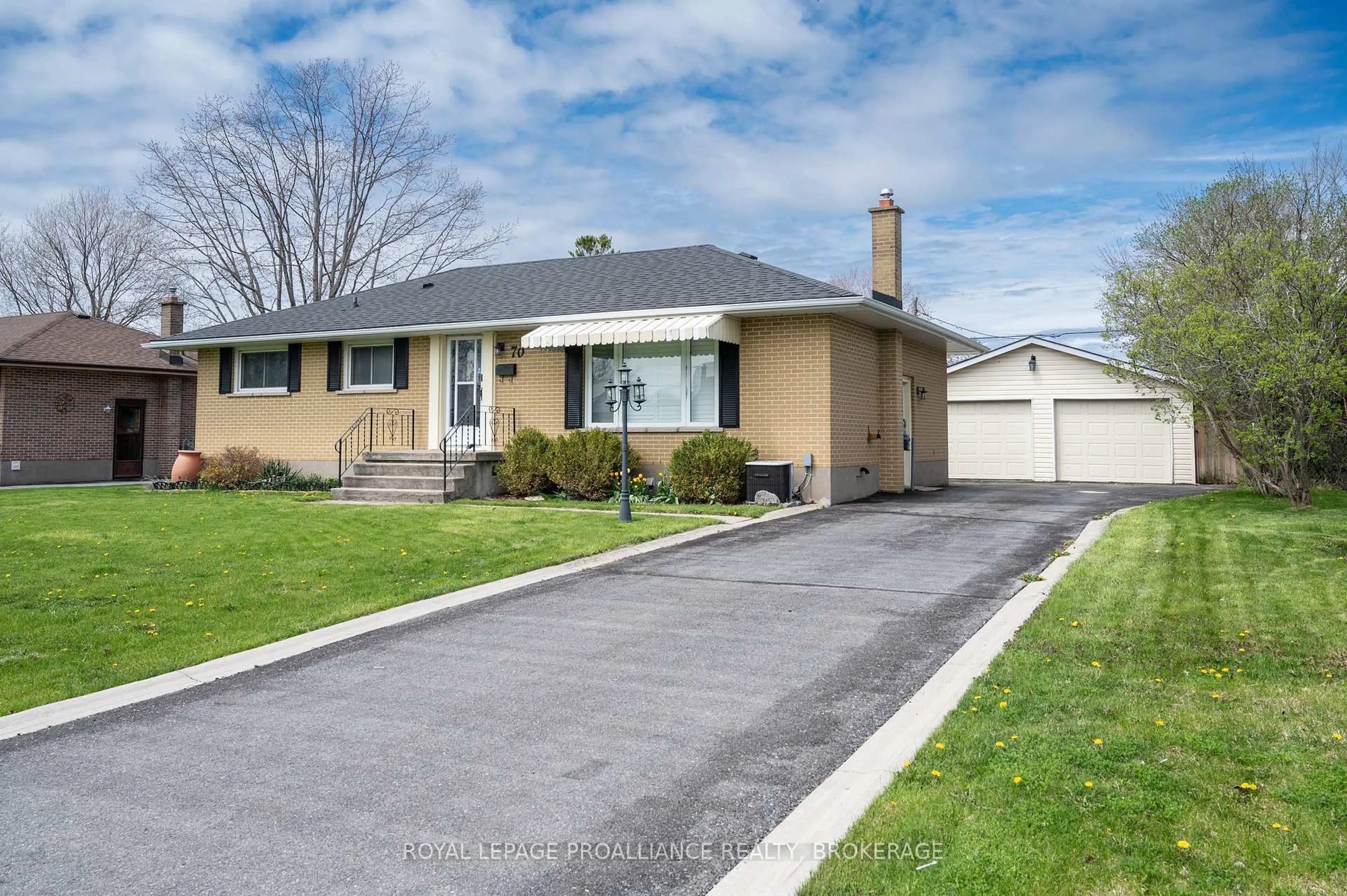 Home with vinyl exterior material, street for 70 Briscoe St, Loyalist Ontario K7N 1G1