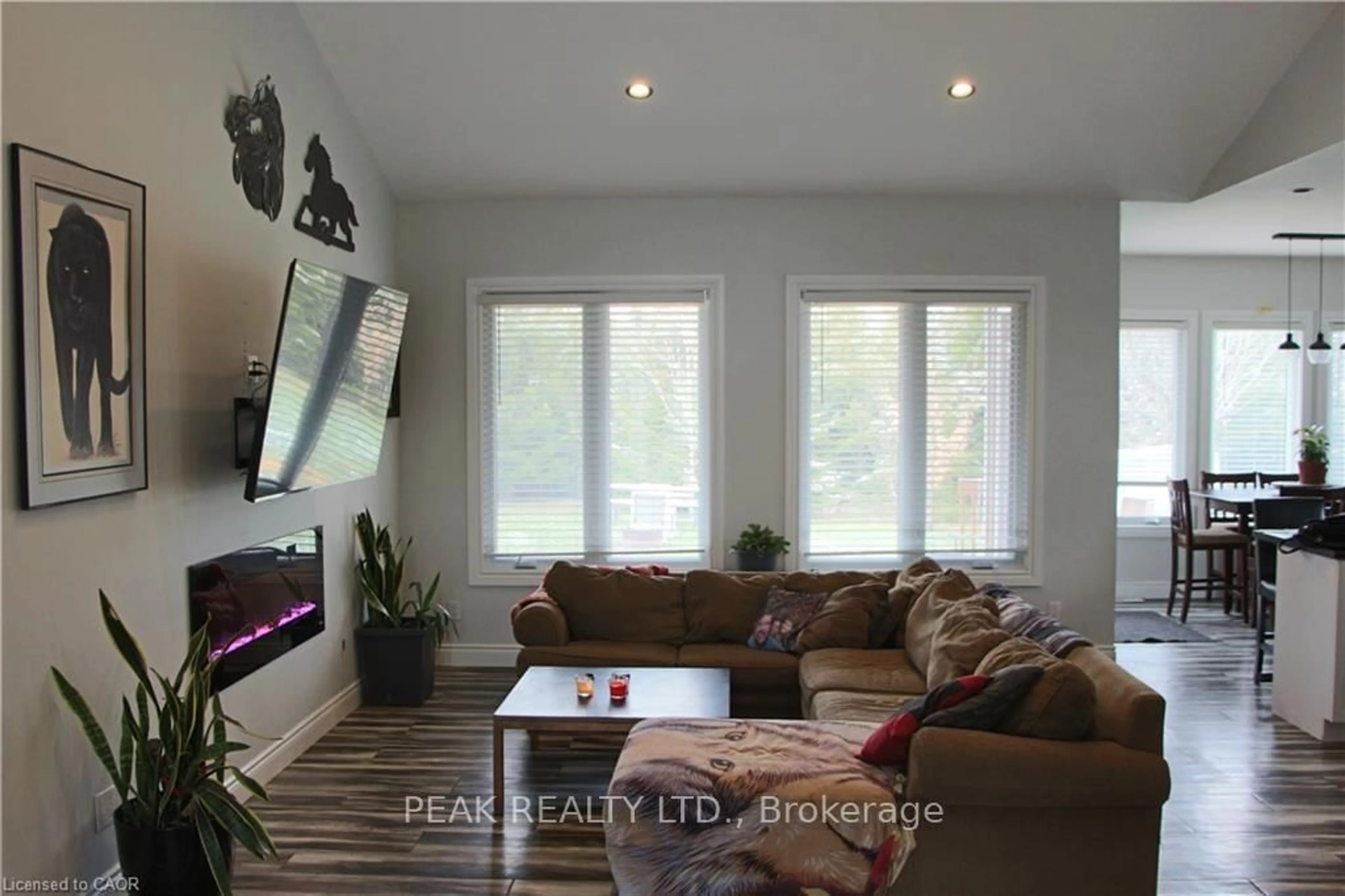 Living room with furniture, wood/laminate floor for 38812 Vienna St, Bluewater Ontario N0M 2R0