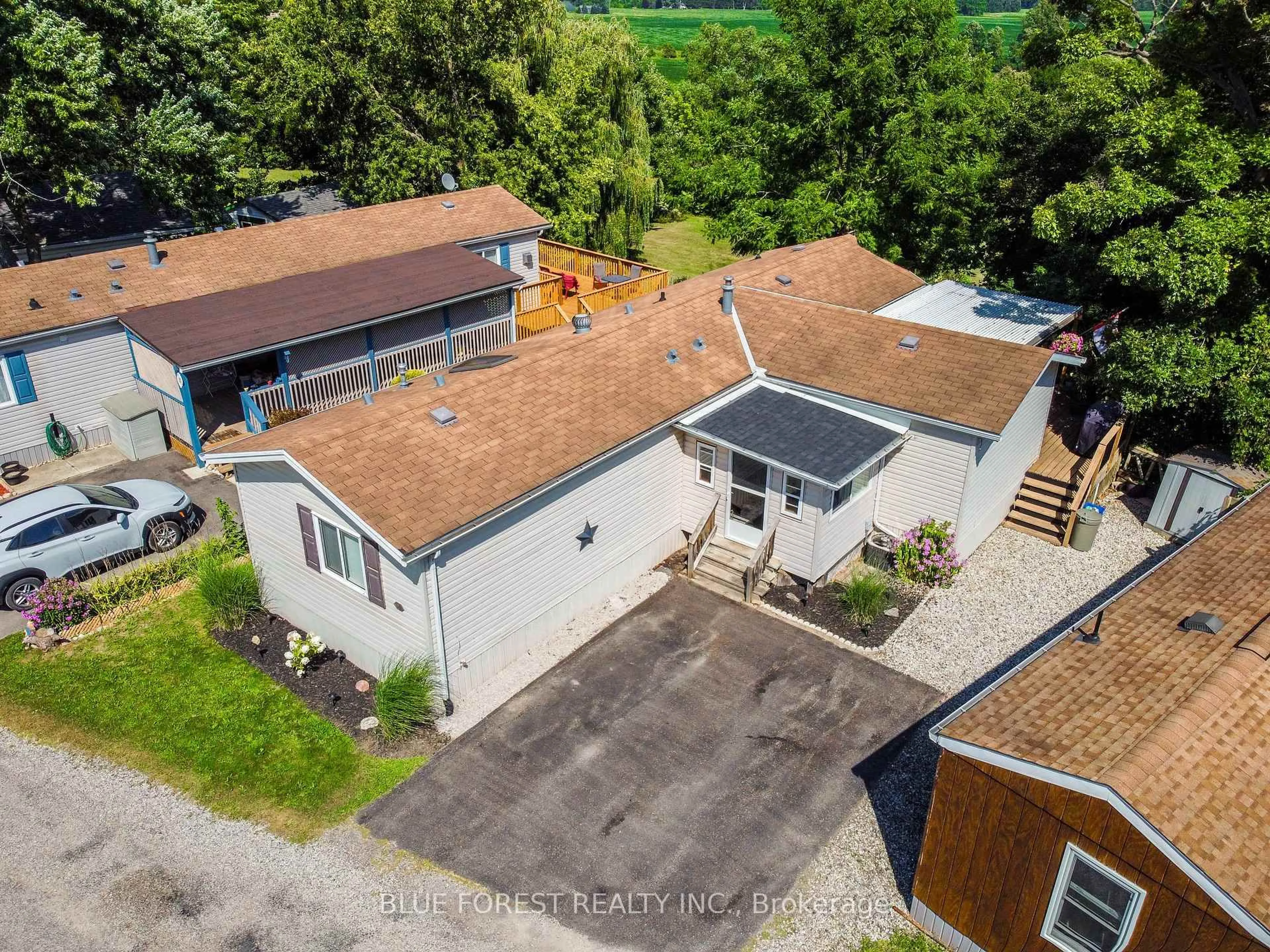 A pic from outside/outdoor area/front of a property/back of a property/a pic from drone, street for 3100 Dorchester Rd #52, Thames Centre Ontario N0L 1G5