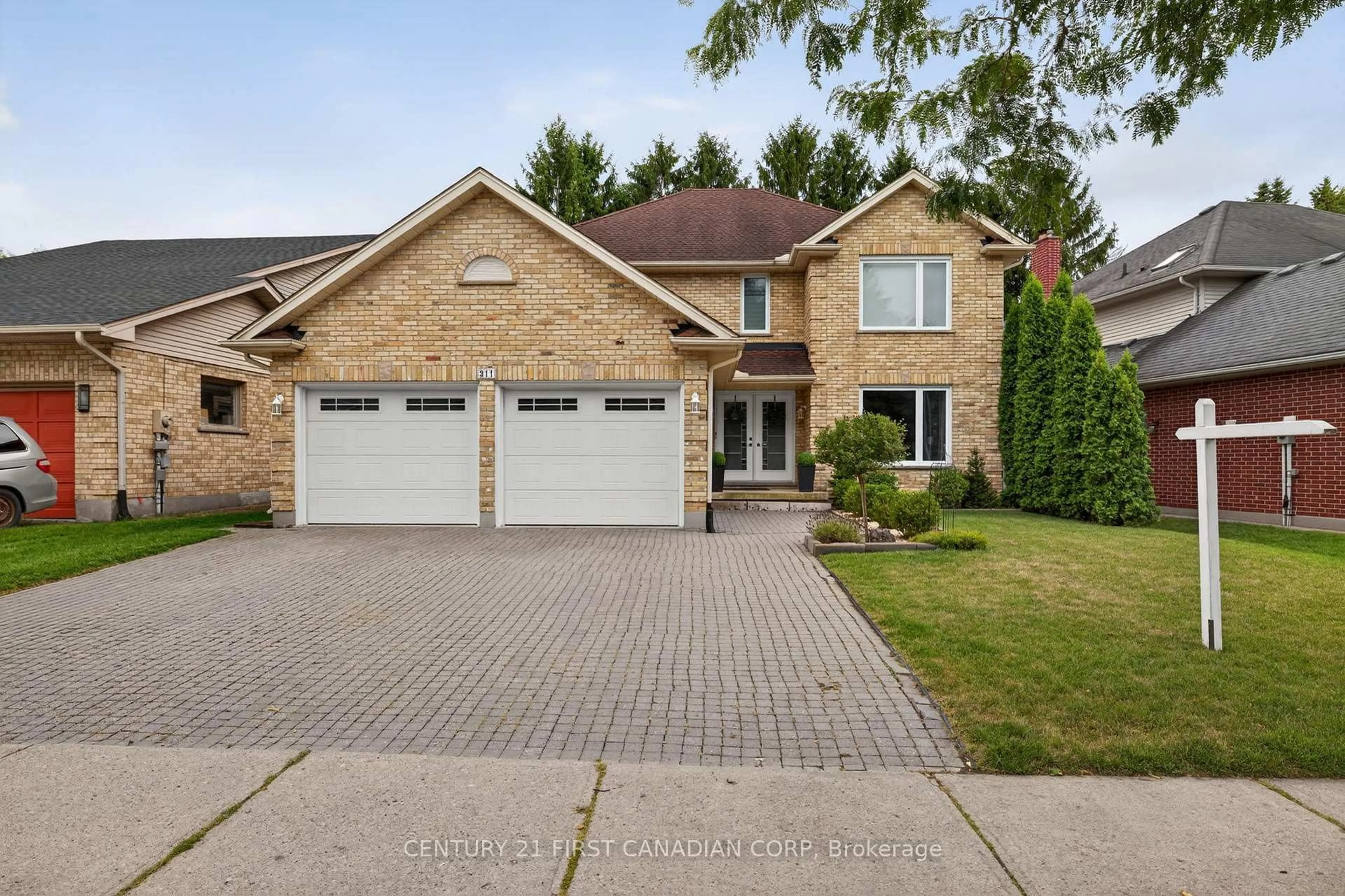 Home with brick exterior material, street for 311 Ambleside Dr, London North Ontario N6G 4V8