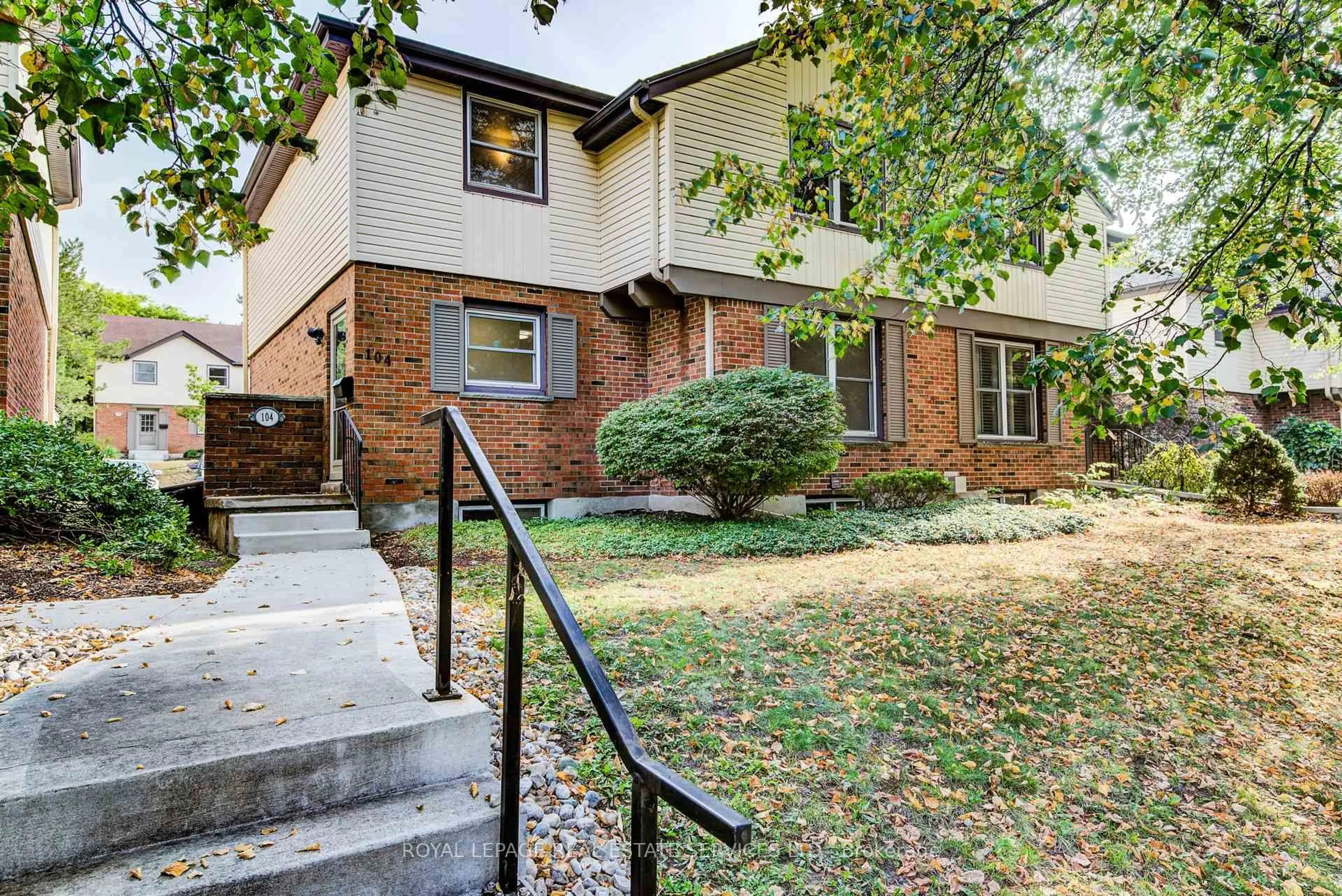 Home with brick exterior material, street for 104 McDougall Rd #3, Waterloo Ontario N2L 5C5