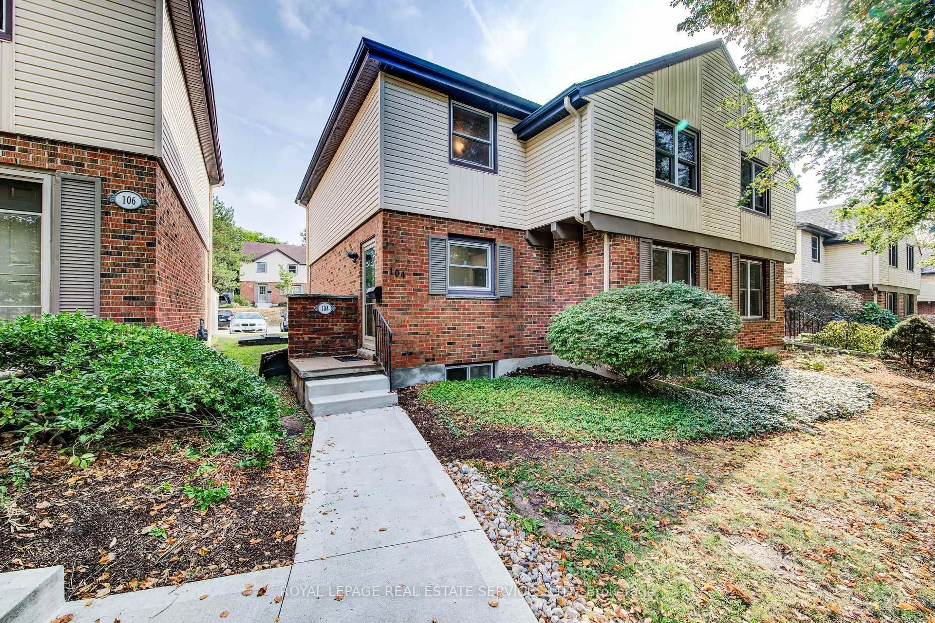 Home with brick exterior material, street for 104 McDougall Rd #3, Waterloo Ontario N2L 5C5