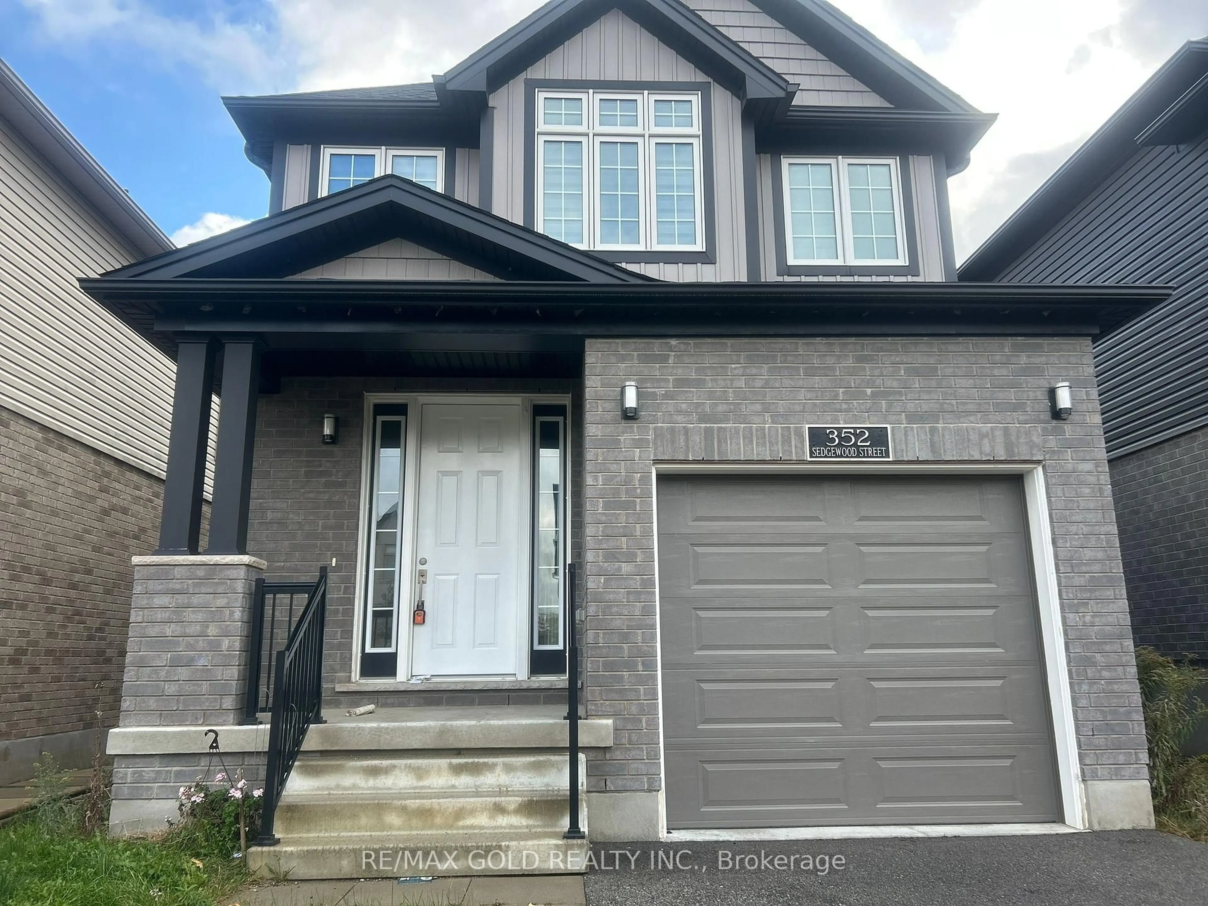 Home with vinyl exterior material, street for 352 Sedgewood St, Kitchener Ontario N2P 0H9