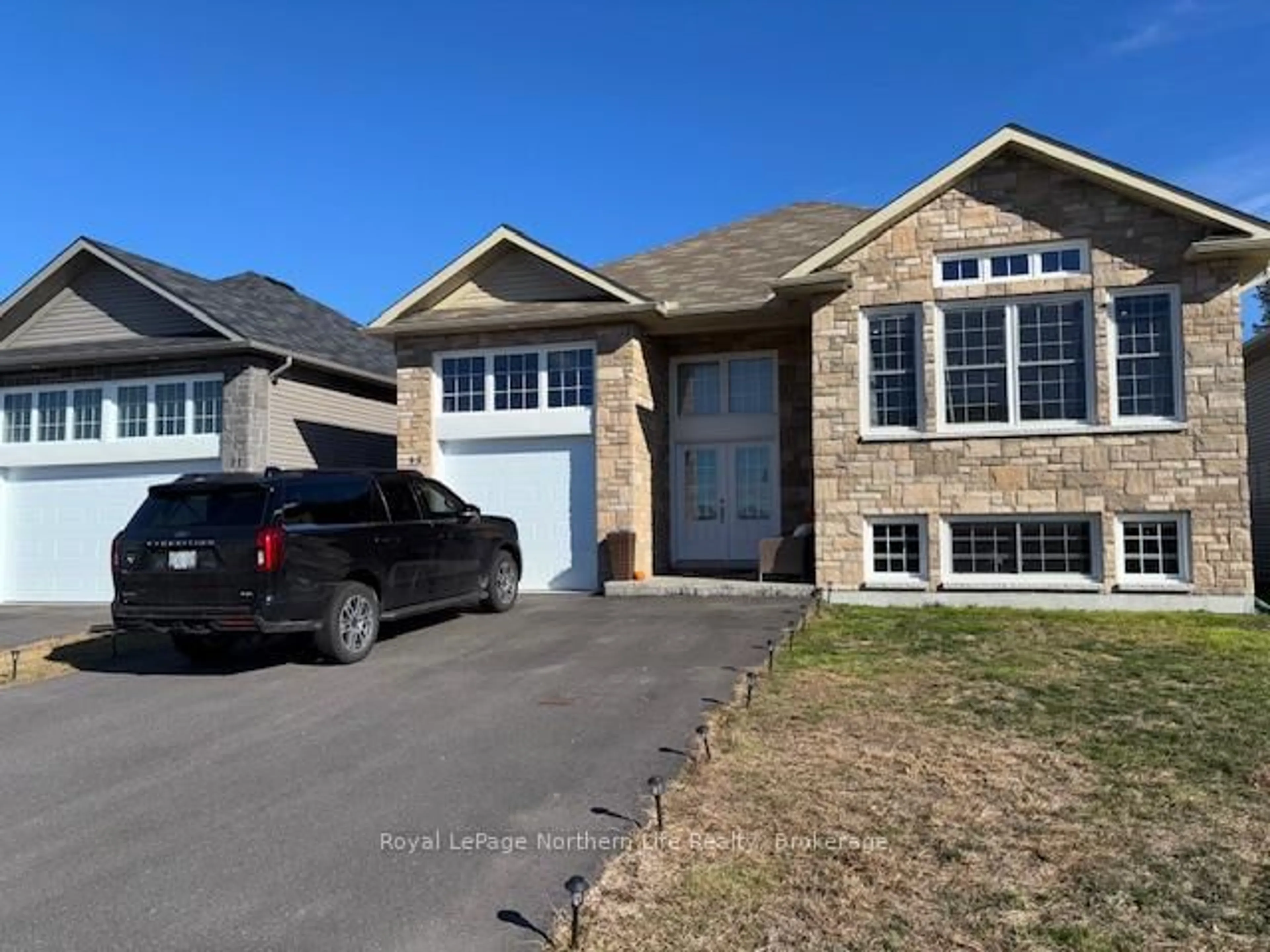 Home with brick exterior material, street for 49 Trillium Dr, North Bay Ontario P1A 0G6