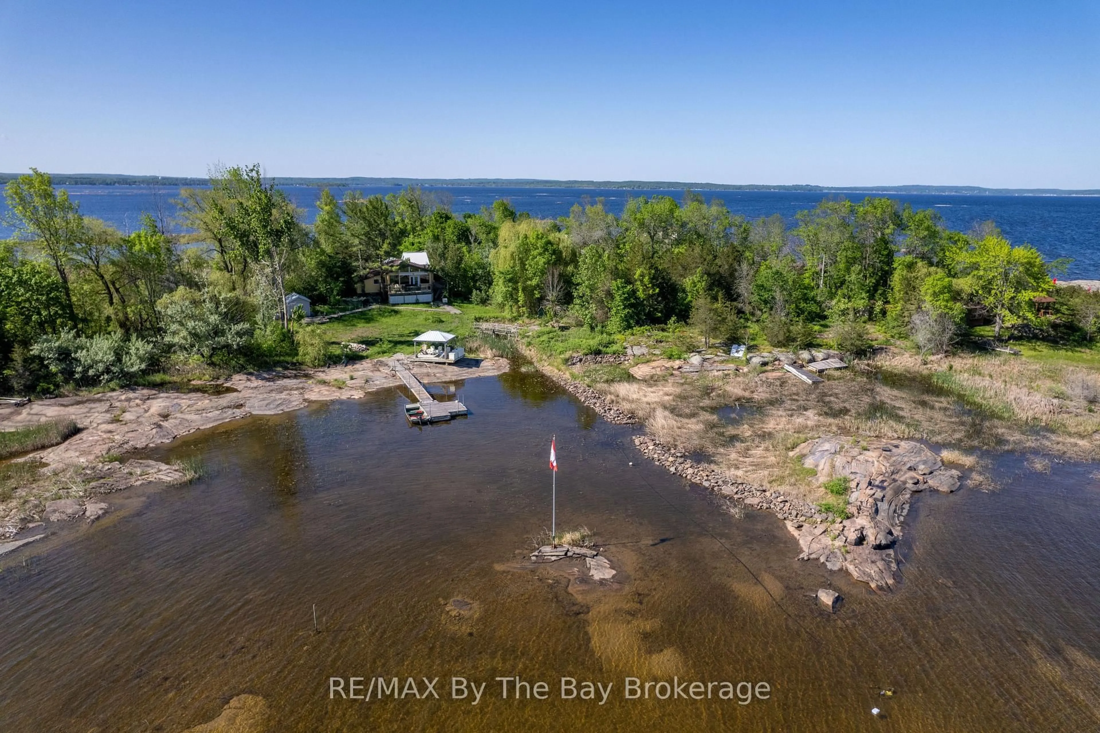 A pic from outside/outdoor area/front of a property/back of a property/a pic from drone, water/lake/river/ocean view for 116 Island 150/ Brosseau Island, Georgian Bay Ontario L0K 1S0