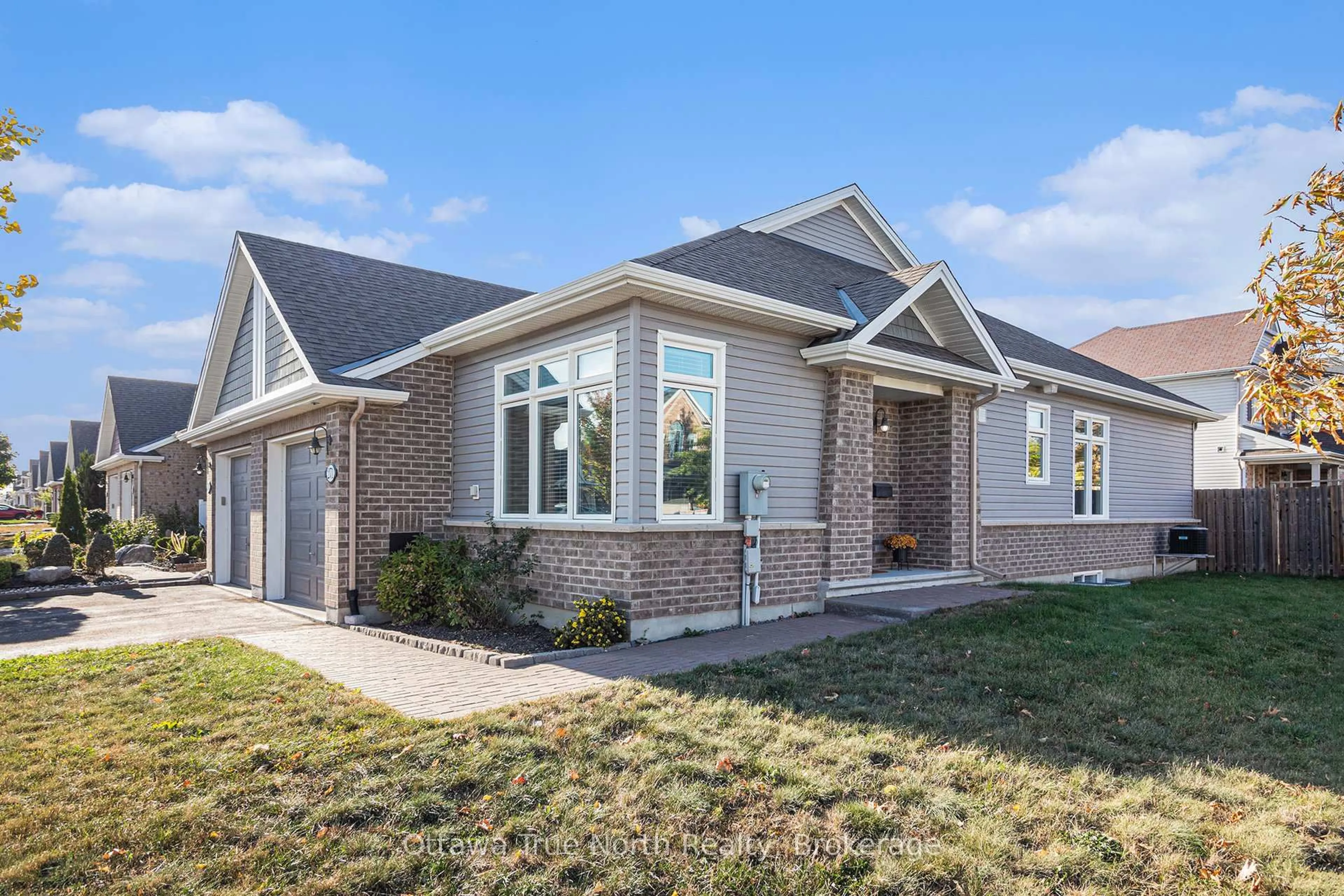 Home with brick exterior material, street for 271 Brambling Way, Ottawa Ontario K2J 0E4