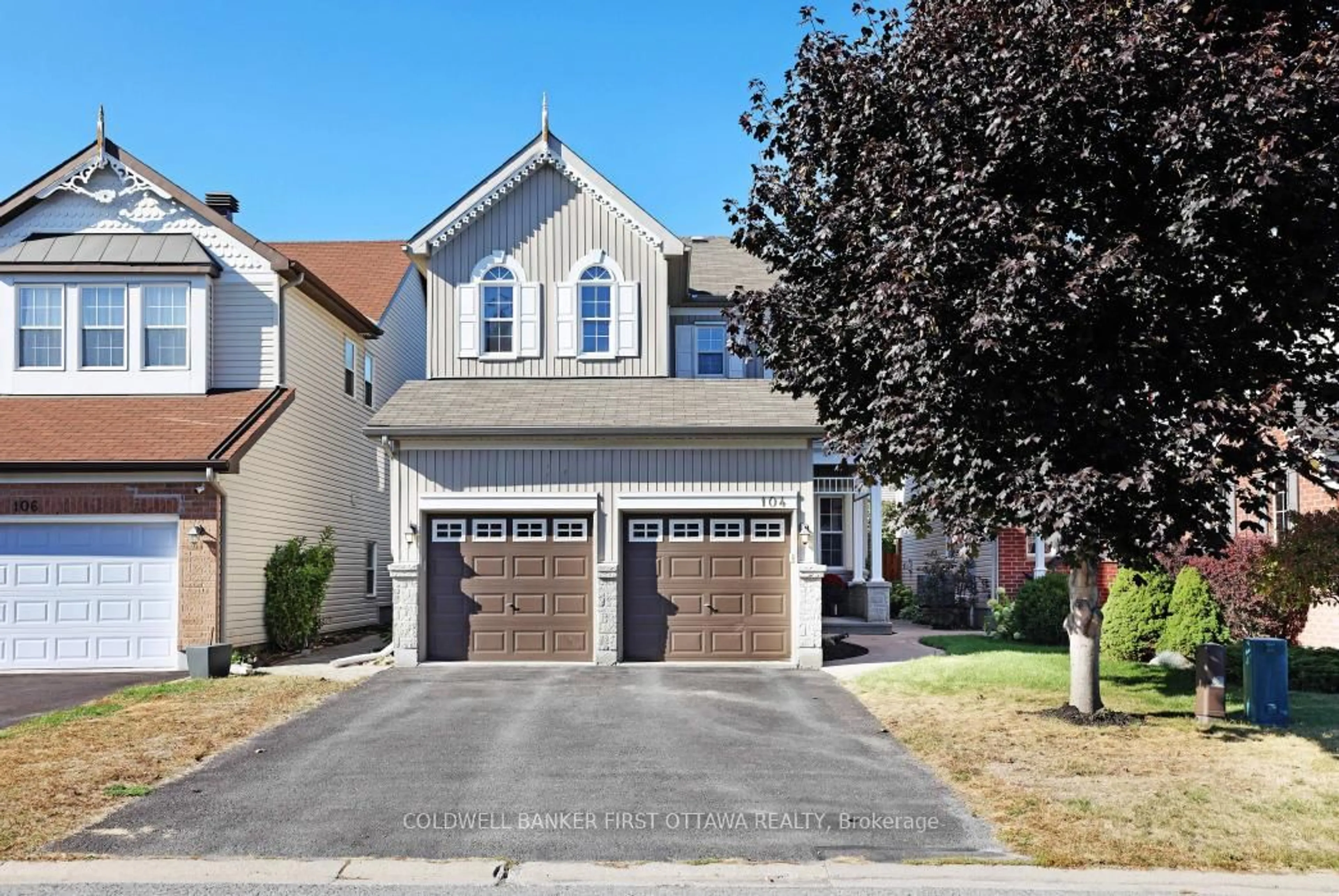 Home with brick exterior material, street for 104 Streamside Cres, Ottawa Ontario K2W 0A9