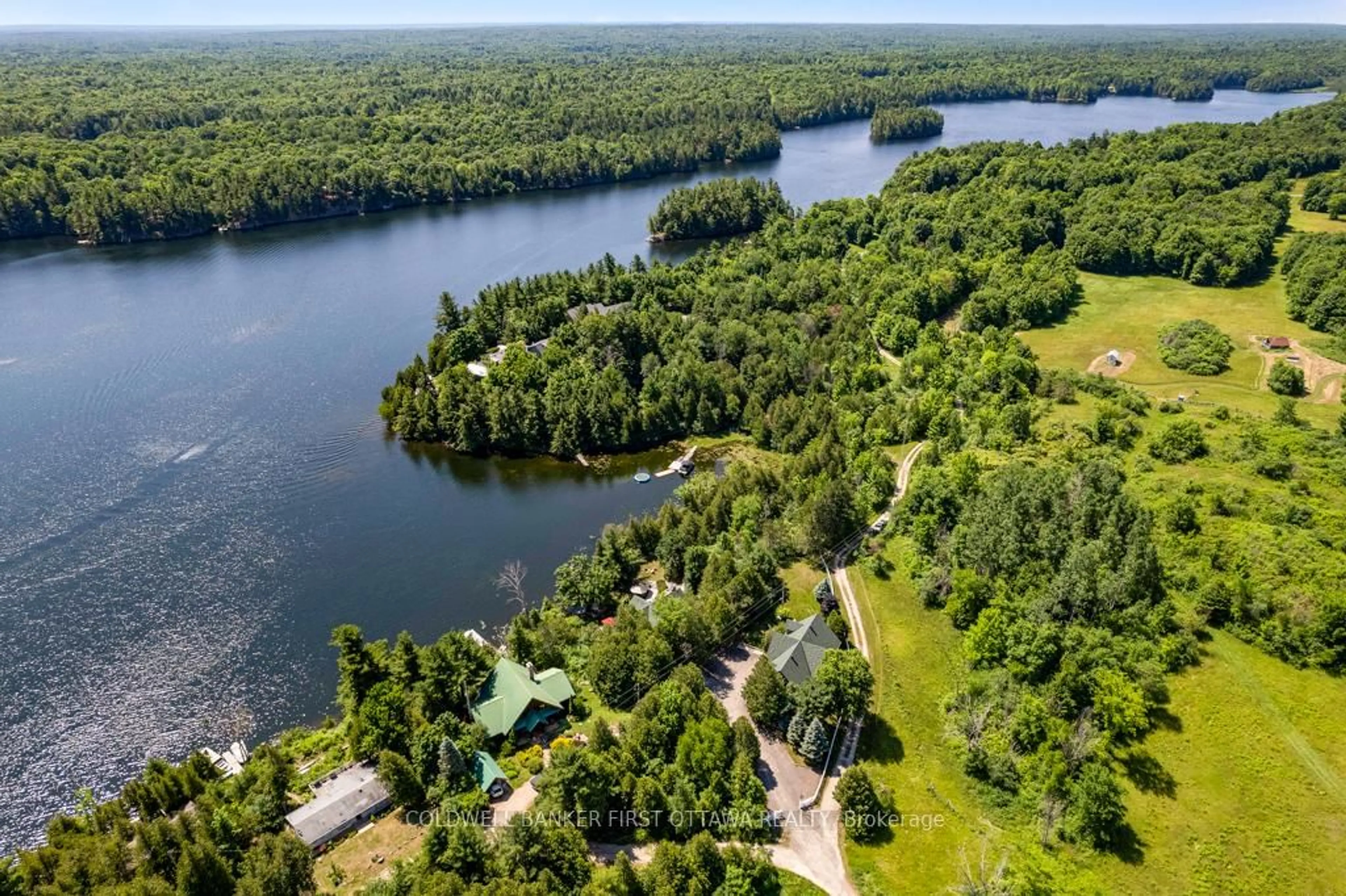 A pic from outside/outdoor area/front of a property/back of a property/a pic from drone, water/lake/river/ocean view for 320 Pike Lake Route 12 Rd, Perth Ontario K7H 3C5