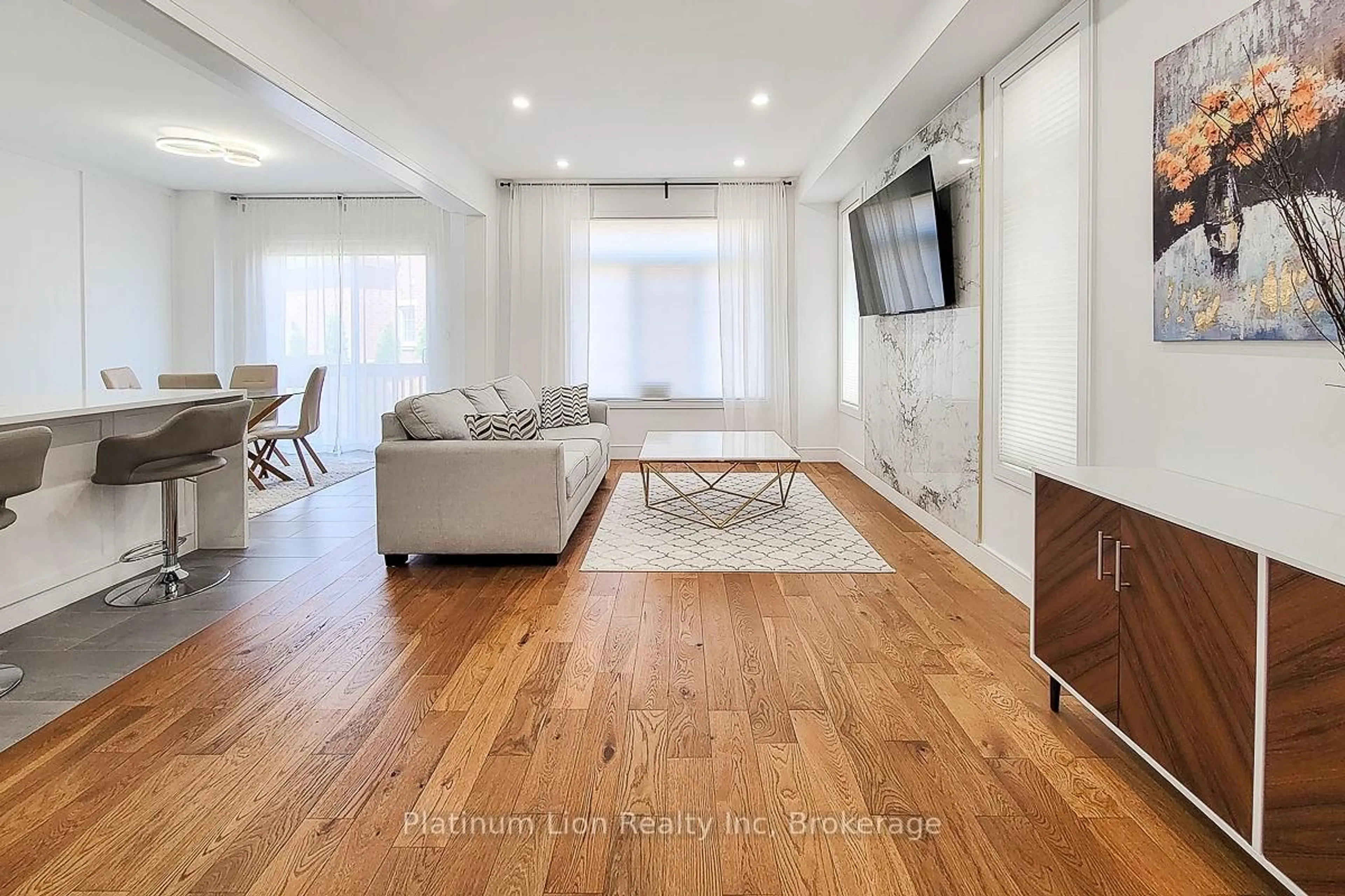 Living room with furniture, wood/laminate floor for 87 Mcknight Ave, Hamilton Ontario L8B 0T8