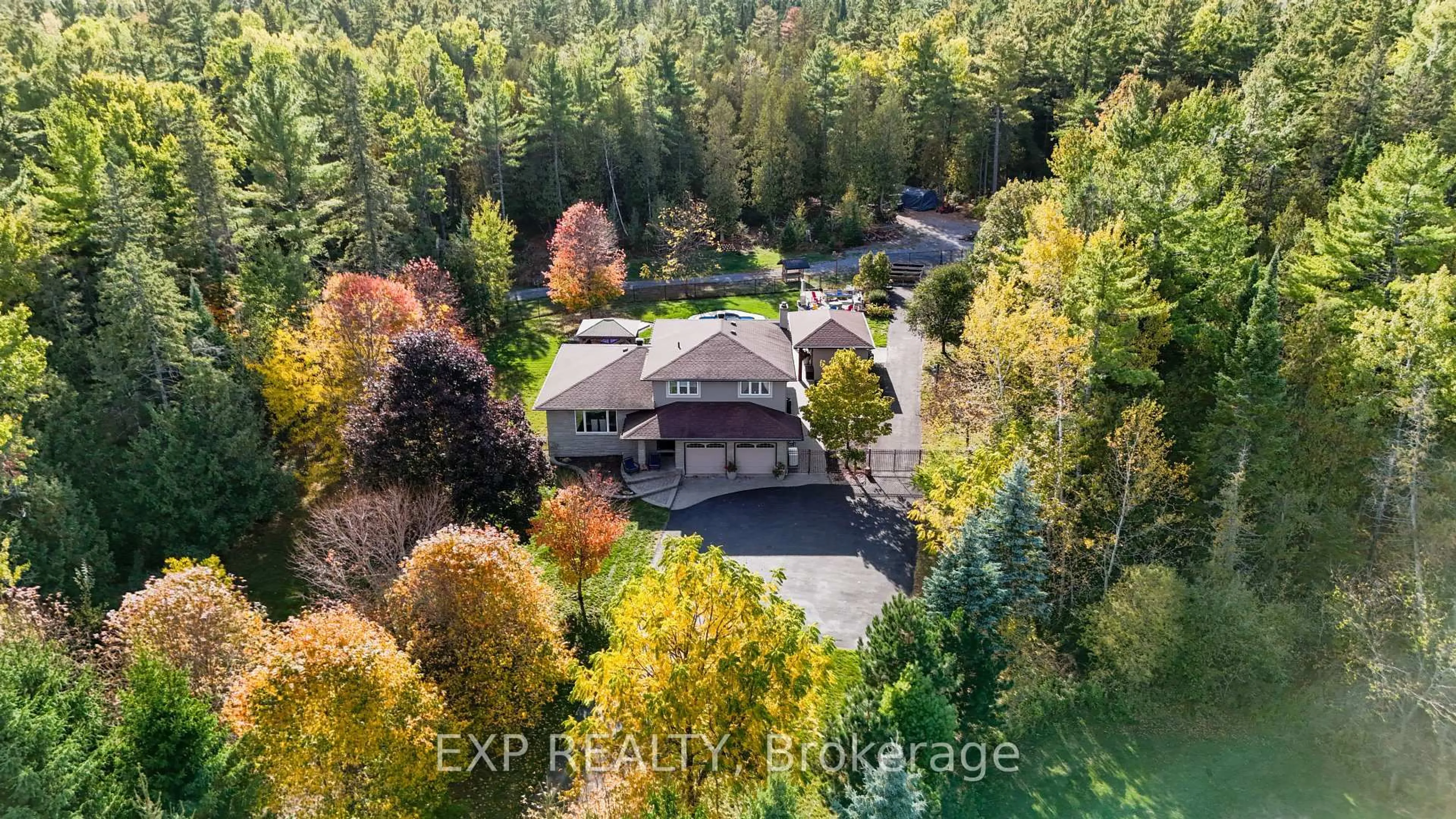A pic from outside/outdoor area/front of a property/back of a property/a pic from drone, forest/trees view for 10 Carlisle Circ, Ashton Ontario K0A 1B0