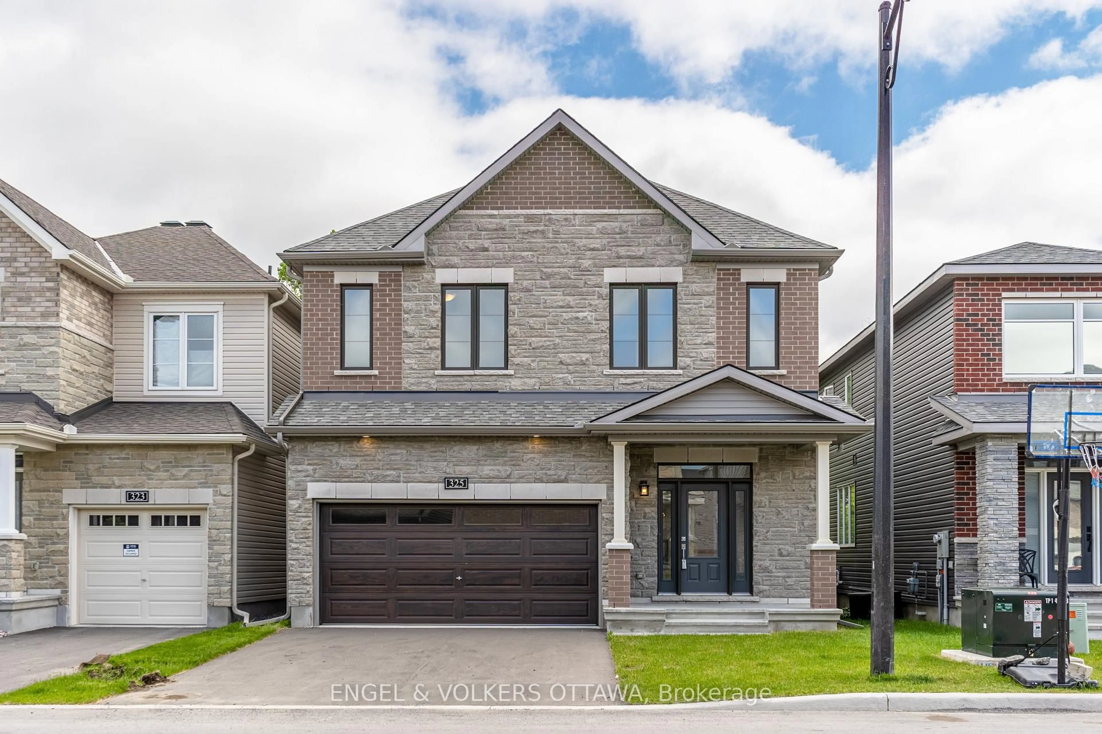 Home with brick exterior material, street for 325 Elsie Macgill Walk, Kanata Ontario K2W 0K7