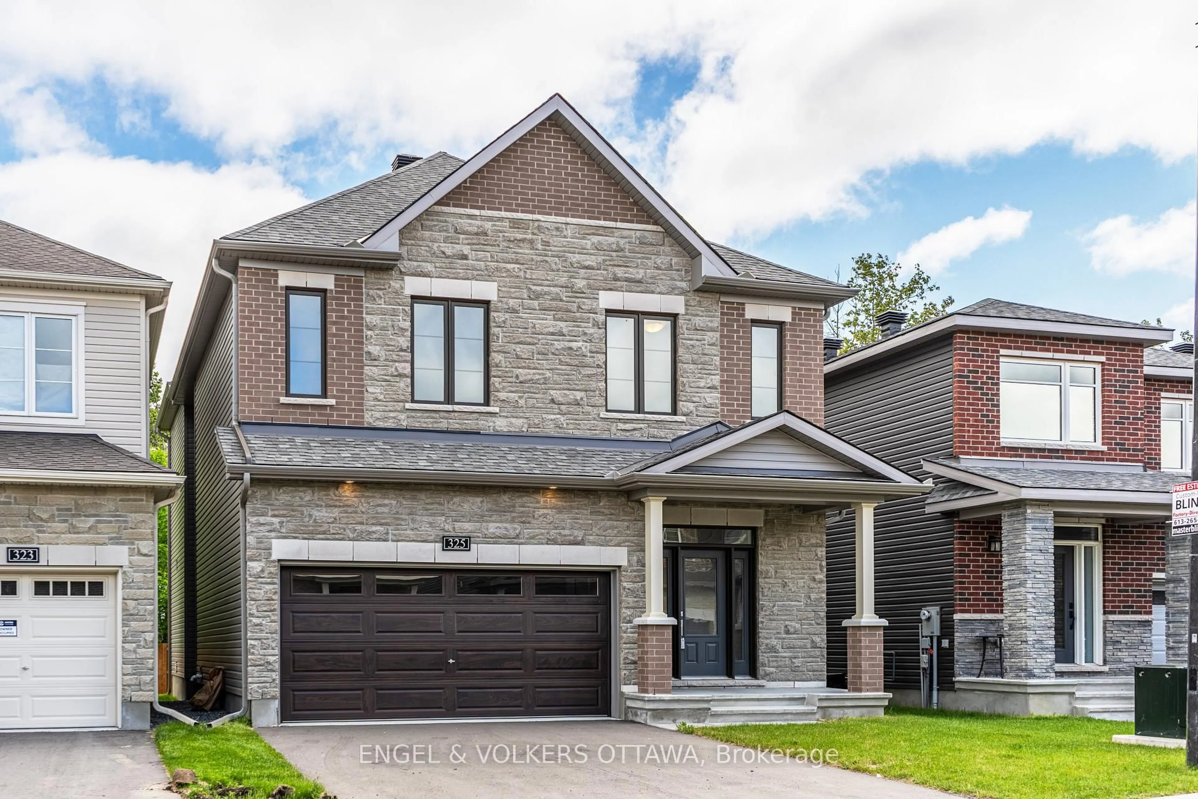Home with brick exterior material, street for 325 Elsie Macgill Walk, Kanata Ontario K2W 0K7