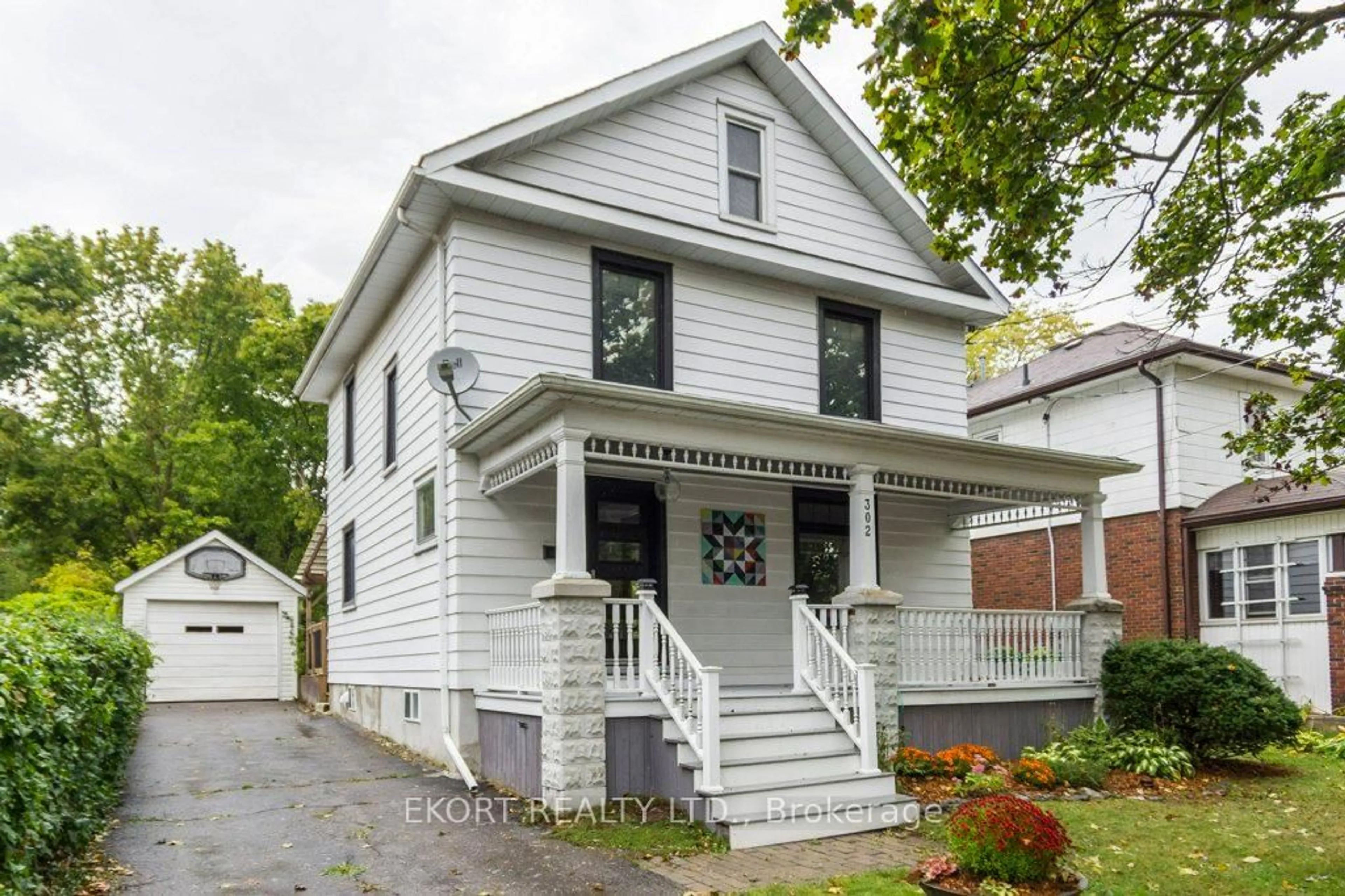 Home with vinyl exterior material, street for 302 Bridge St, Belleville Ontario K8N 1P6