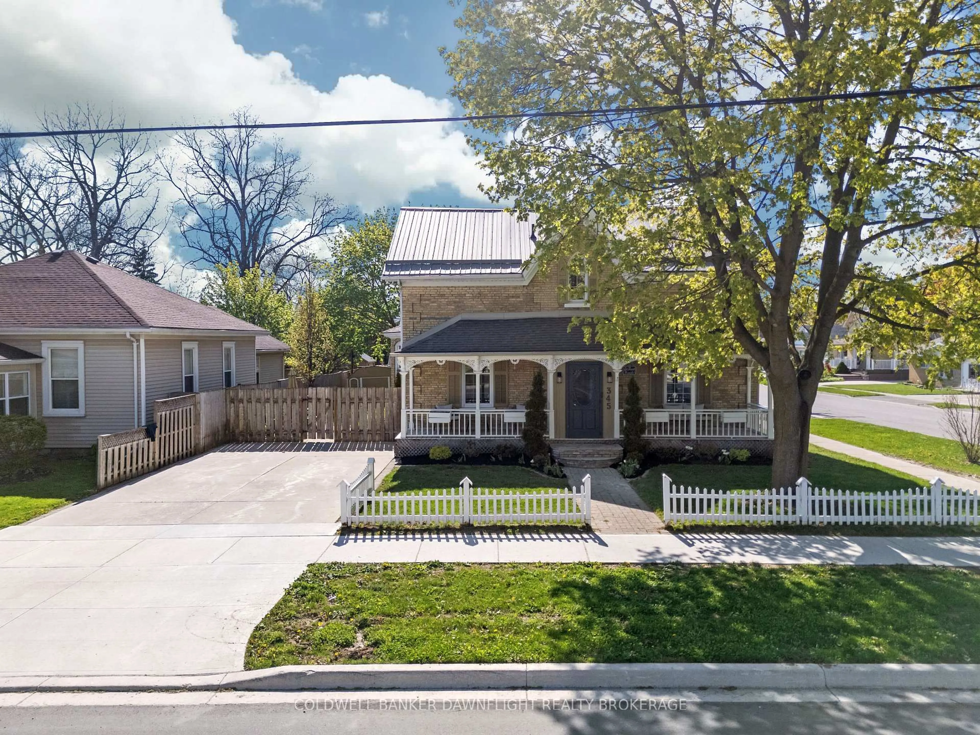 A pic from outside/outdoor area/front of a property/back of a property/a pic from drone, street for 345 William St, South Huron Ontario N0M 1S6