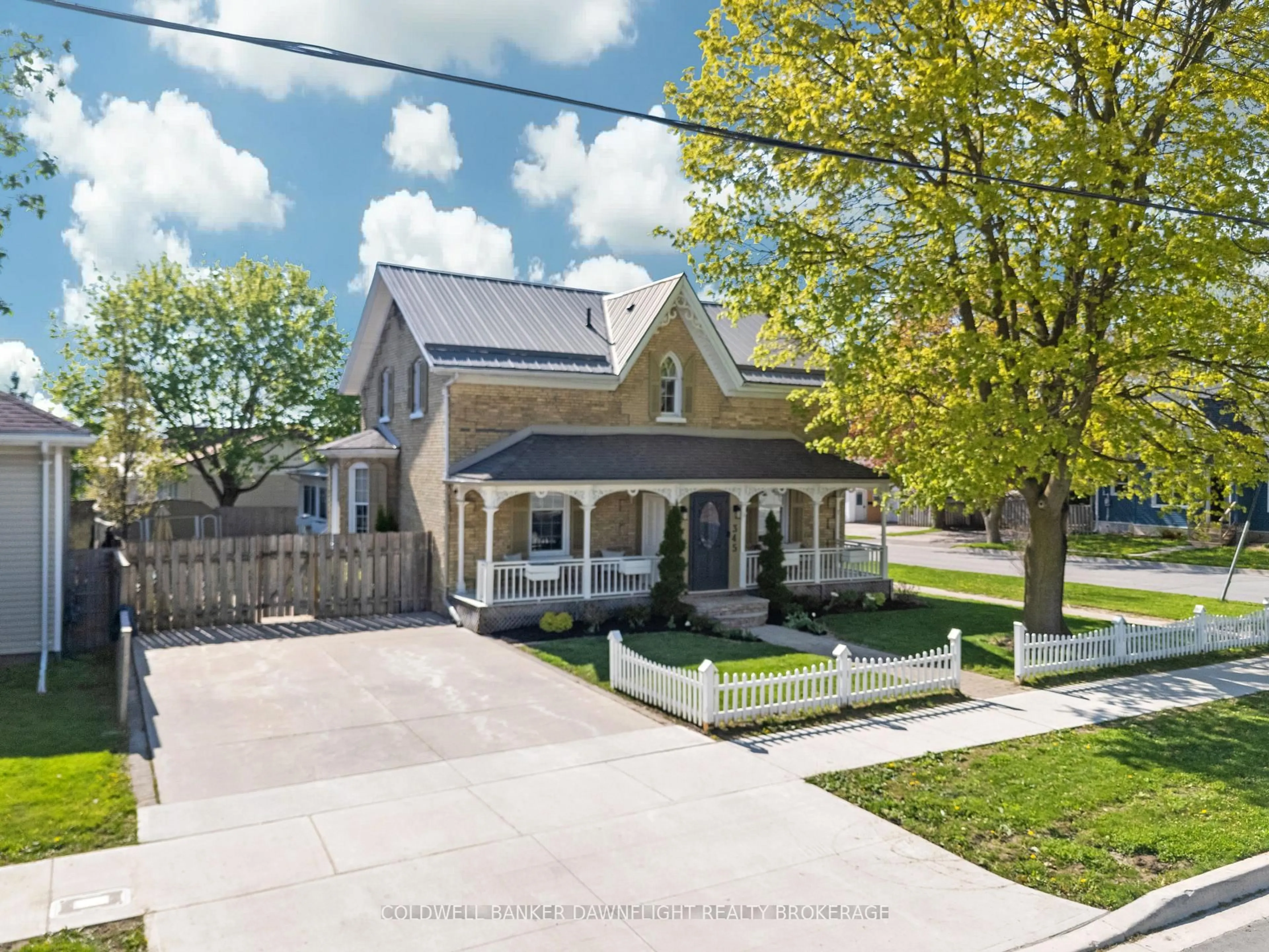 A pic from outside/outdoor area/front of a property/back of a property/a pic from drone, street for 345 William St, South Huron Ontario N0M 1S6