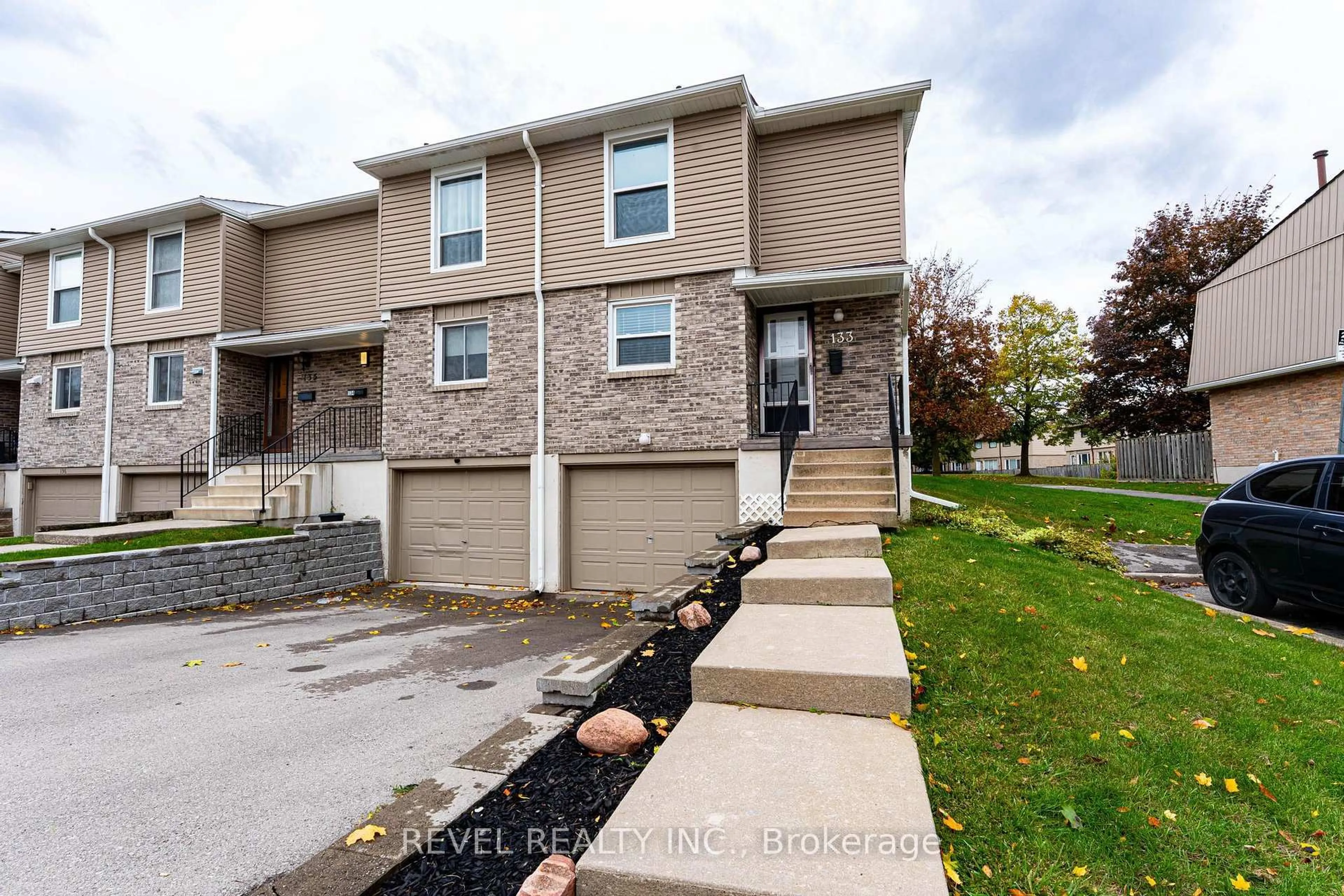 A pic from outside/outdoor area/front of a property/back of a property/a pic from drone, street for 10 Angus Rd #133, Hamilton Ontario L8K 6K3