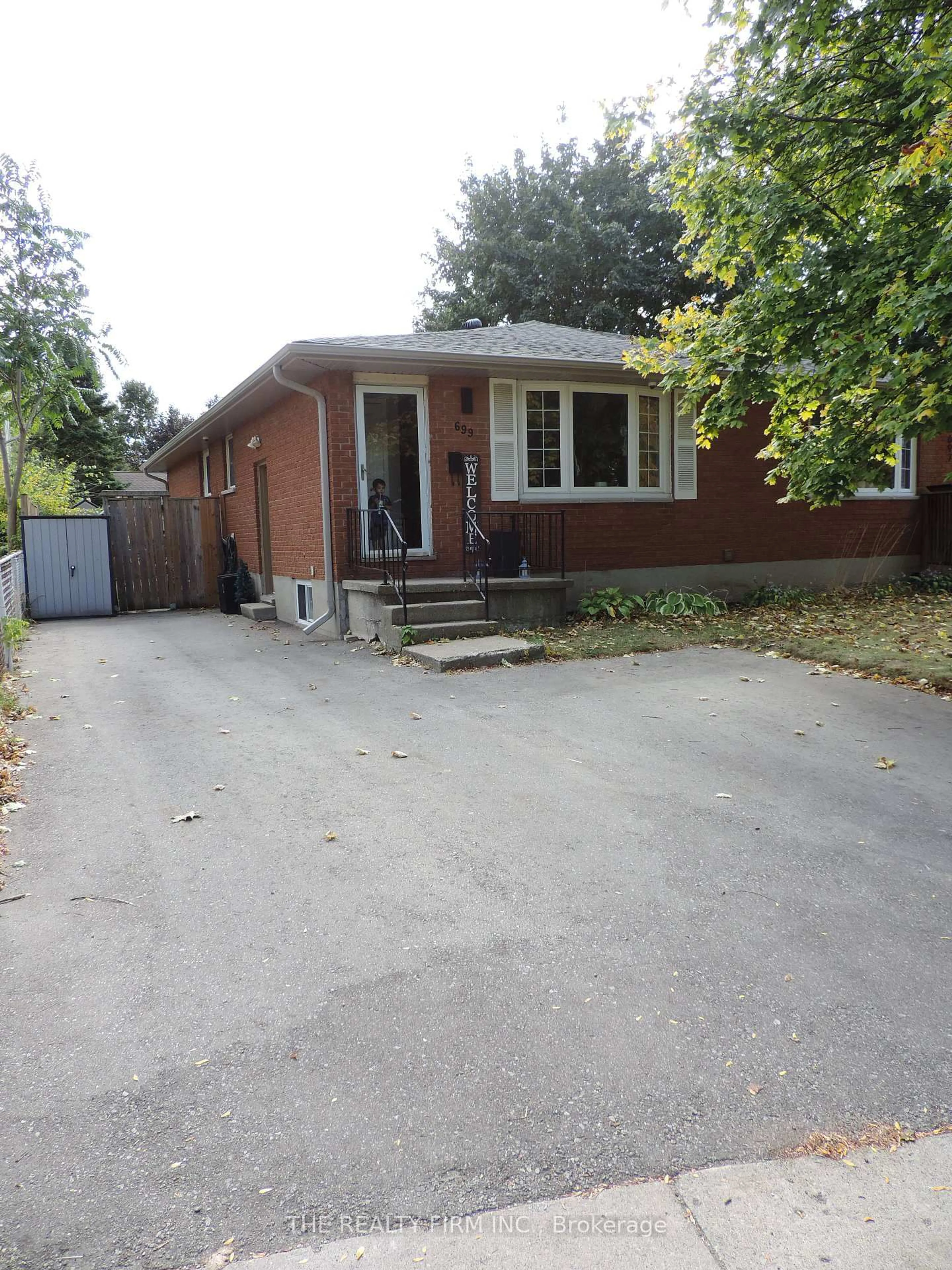 Home with brick exterior material, street for 699 Sevilla Park Pl, London East Ontario N5Y 4H9