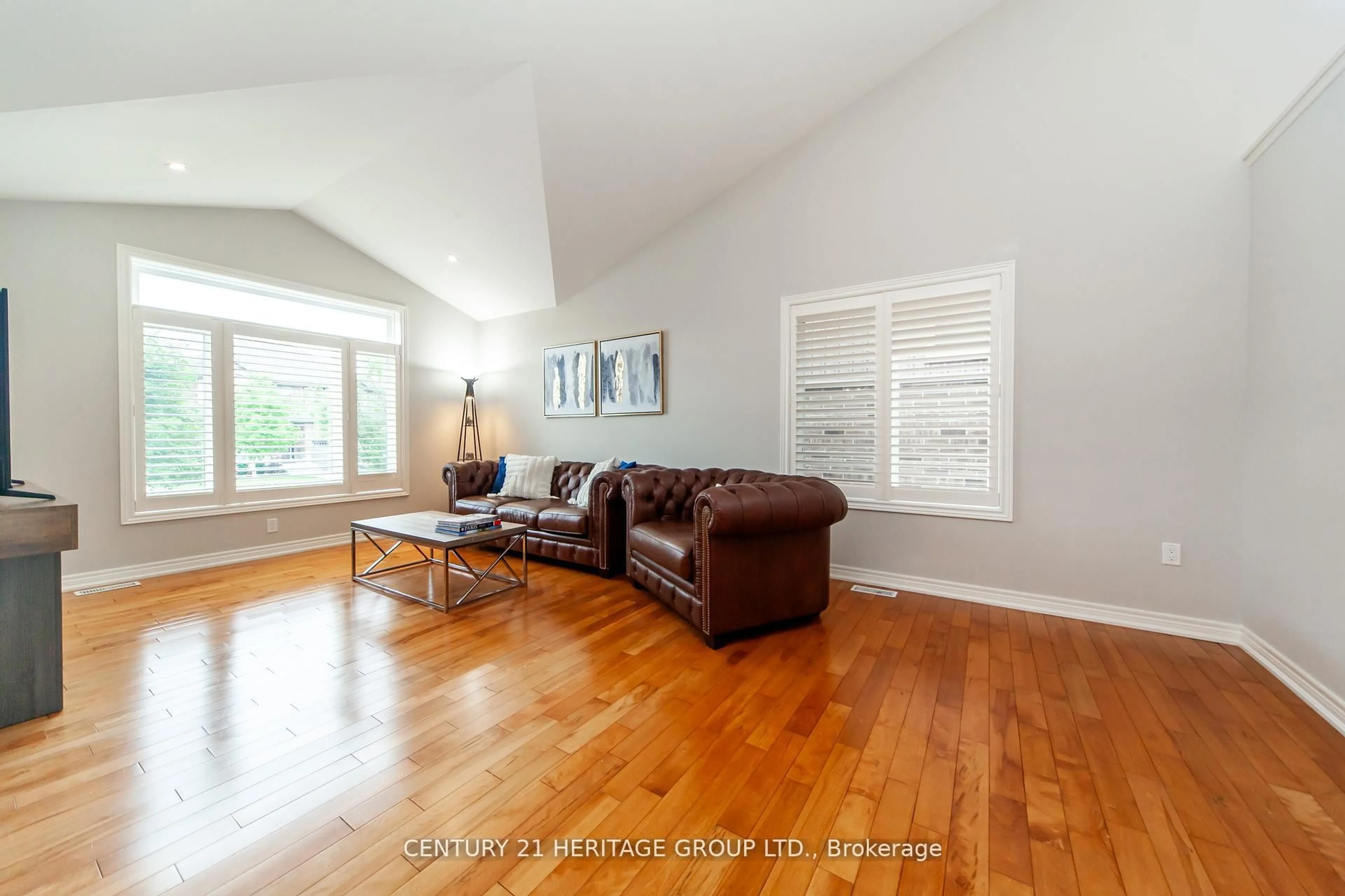 Living room with furniture, wood/laminate floor for 5826 Fiddlehead Lane, Niagara Falls Ontario L2H 0E9