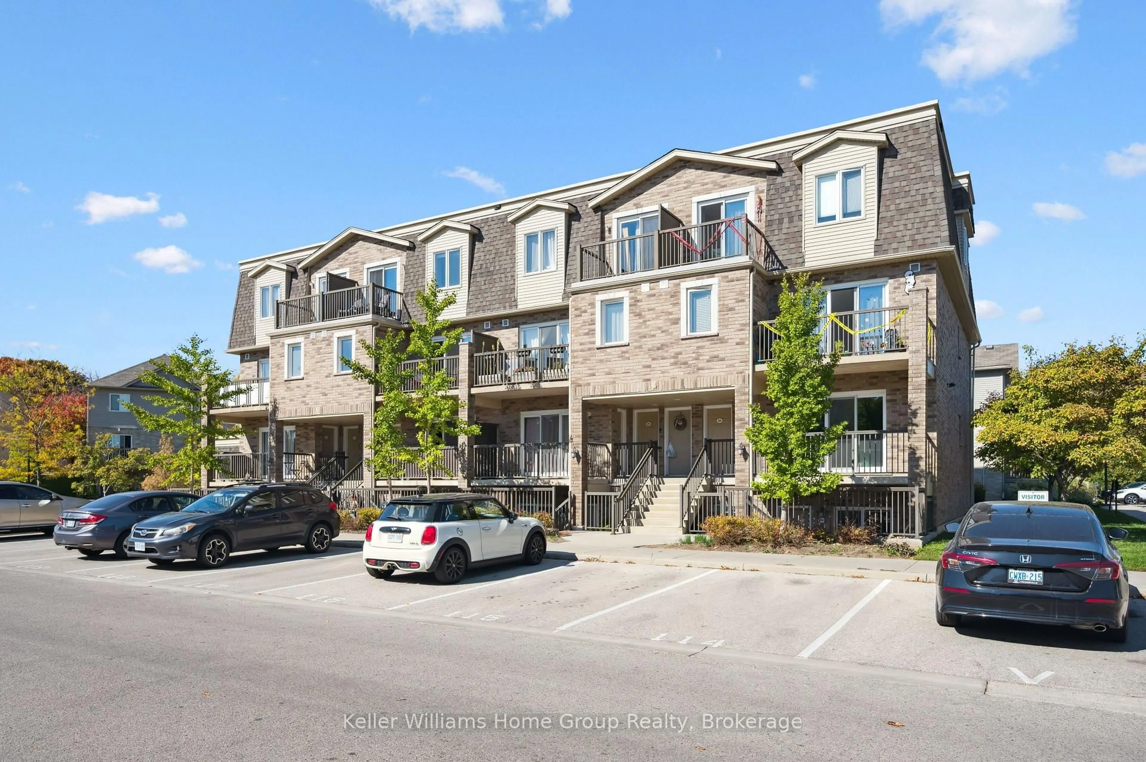 A pic from outside/outdoor area/front of a property/back of a property/a pic from drone, street for 35 Mountford Dr #22, Guelph Ontario N1E 0G6