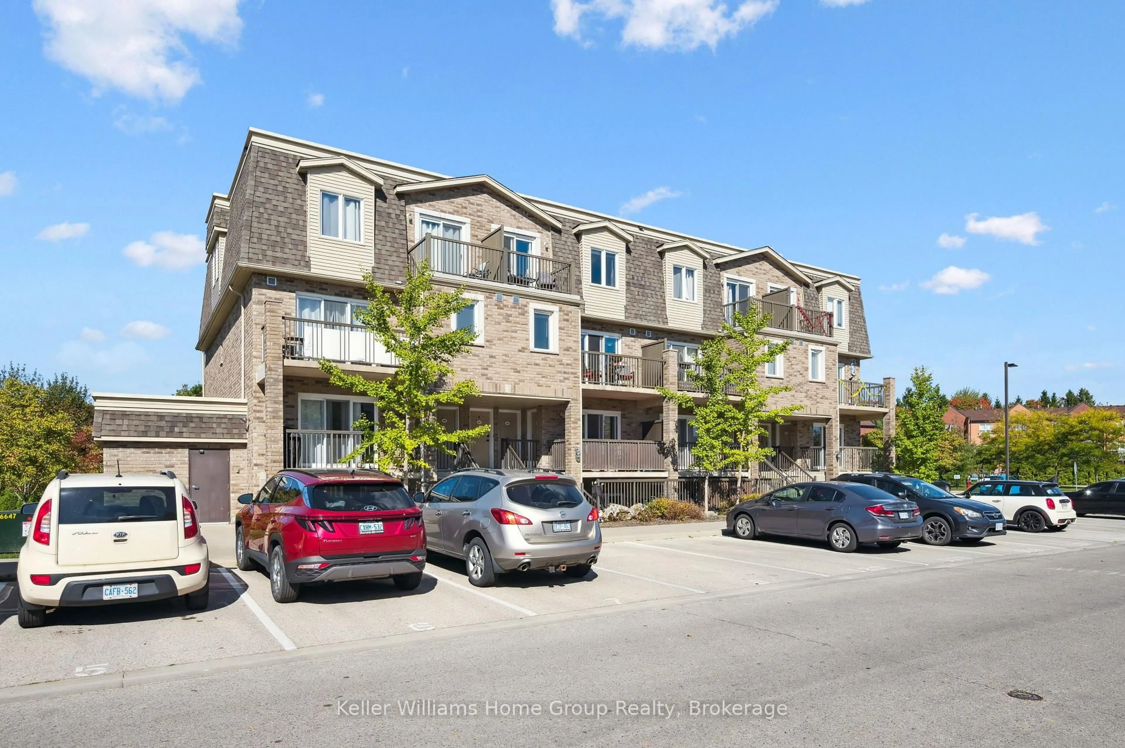 A pic from outside/outdoor area/front of a property/back of a property/a pic from drone, street for 35 Mountford Dr #22, Guelph Ontario N1E 0G6