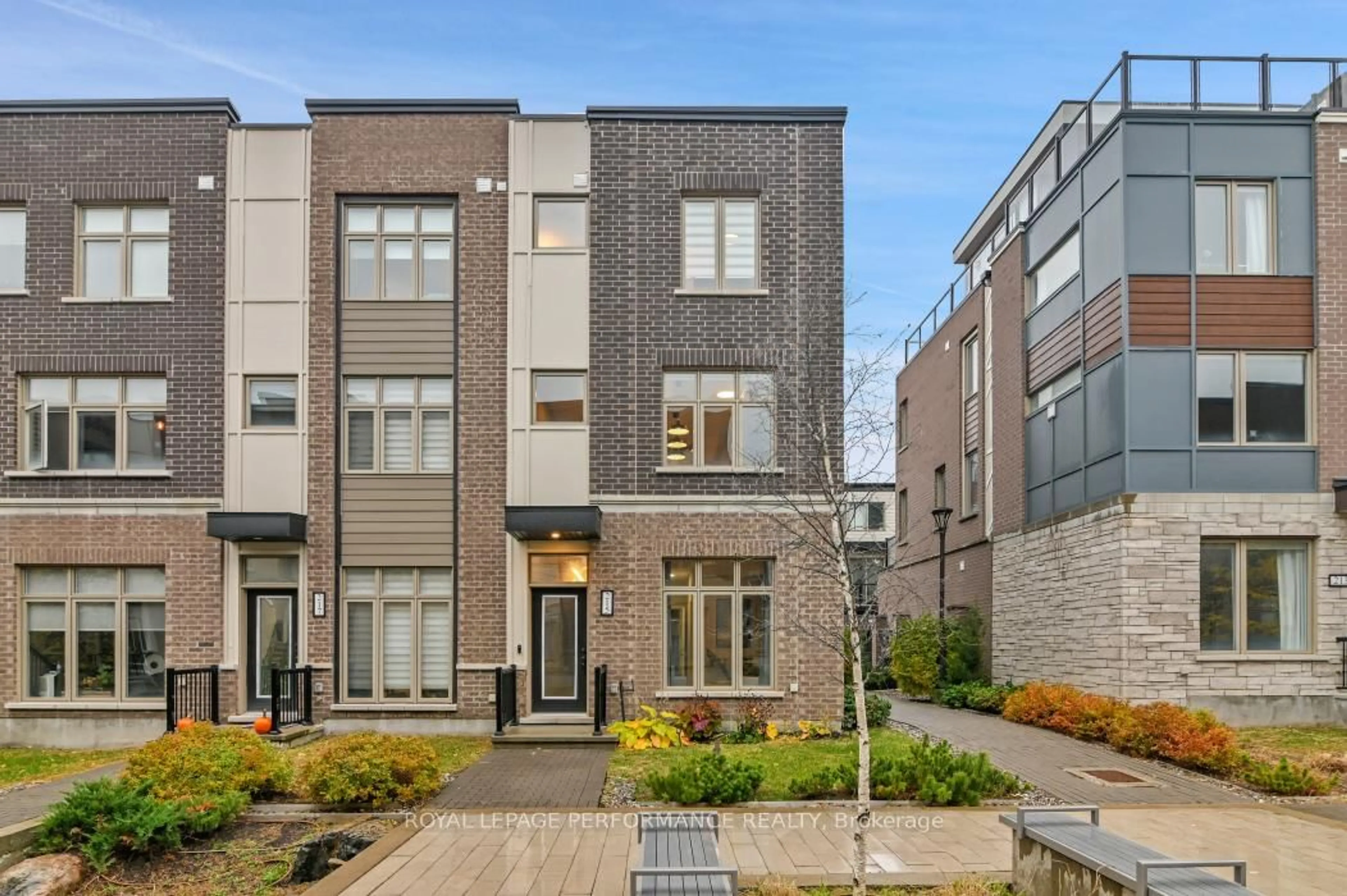 Home with brick exterior material, street for 215 Makadewa Private, Ottawa Ontario K1K 4Z9