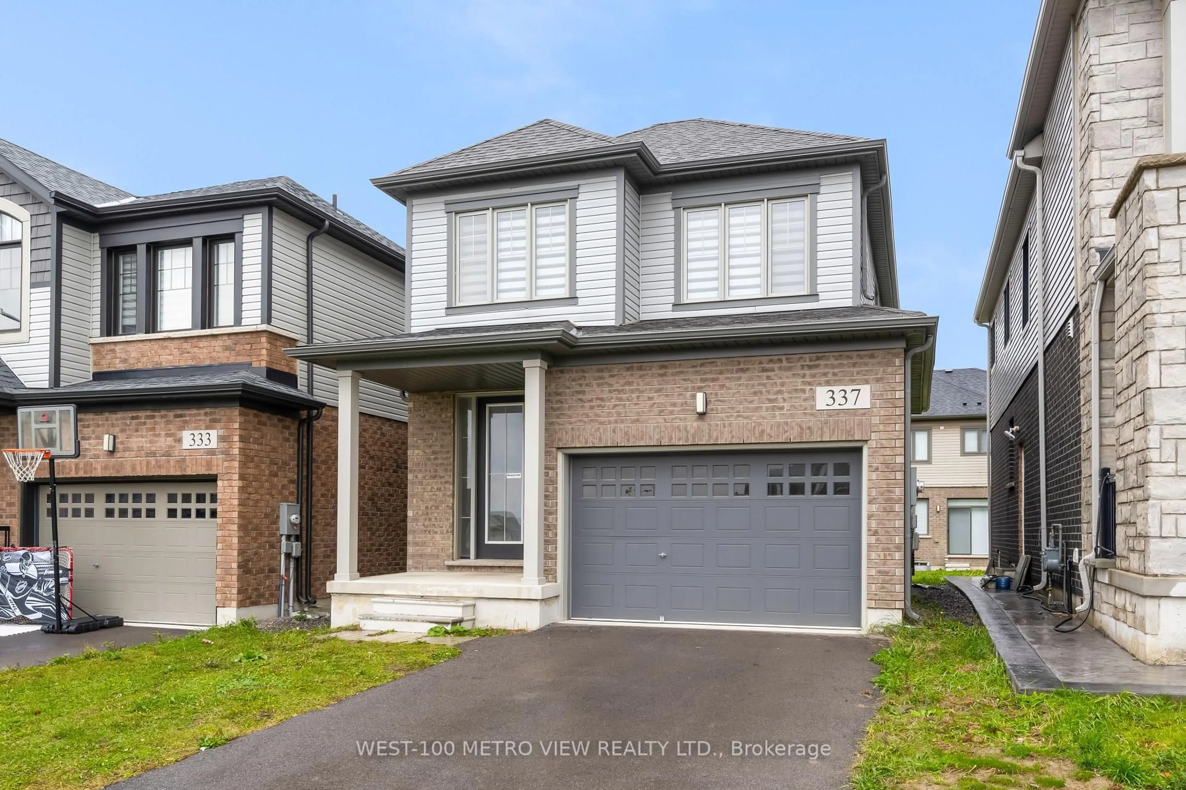 Home with brick exterior material, street for 337 Provident Way, Hamilton Ontario L0R 1W0