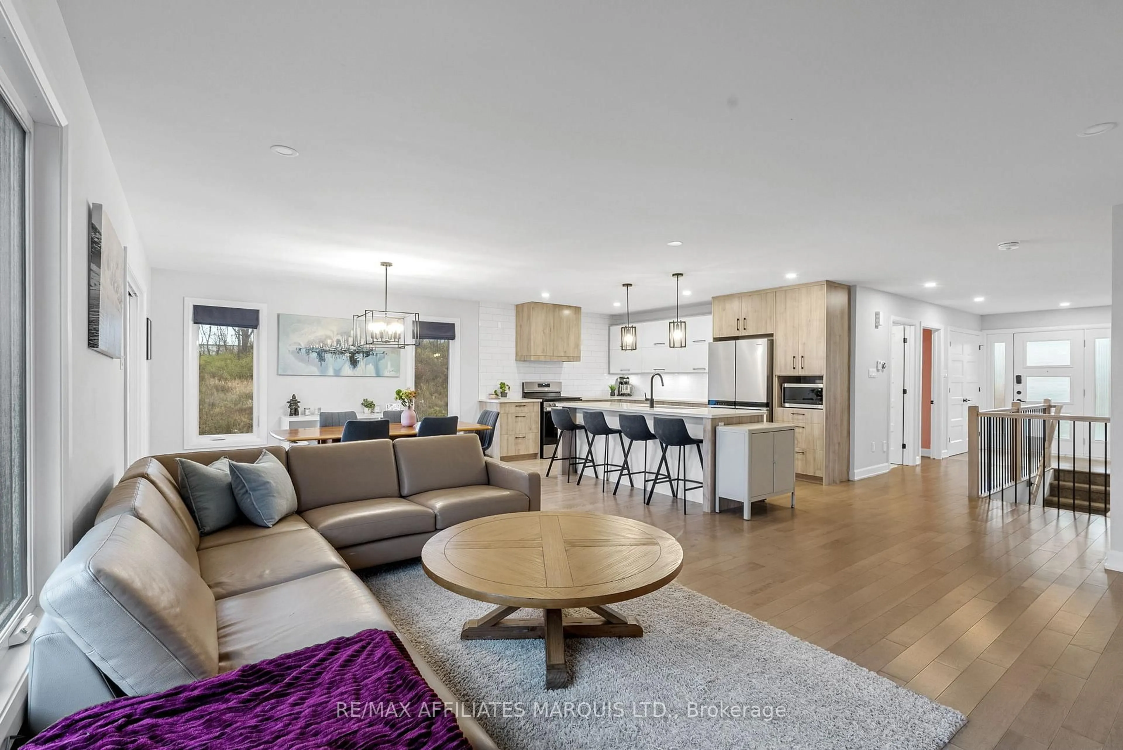 Open concept kitchen, wood/laminate floor for 2341 Crewson Crt, Cornwall Ontario K6H 0H9