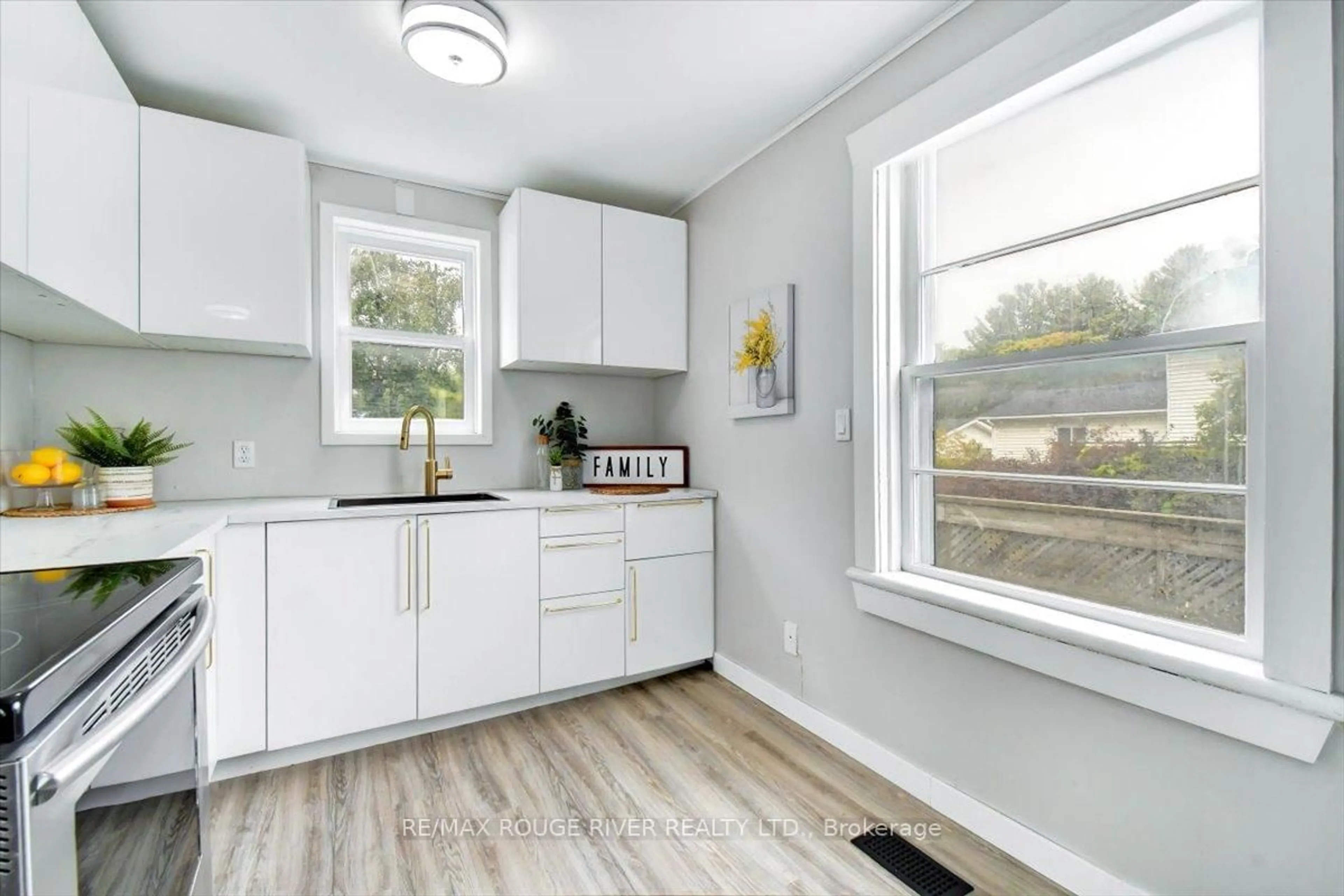 Open concept kitchen, wood/laminate floor for 232 Lyle St, Alnwick/Haldimand Ontario K0K 2G0