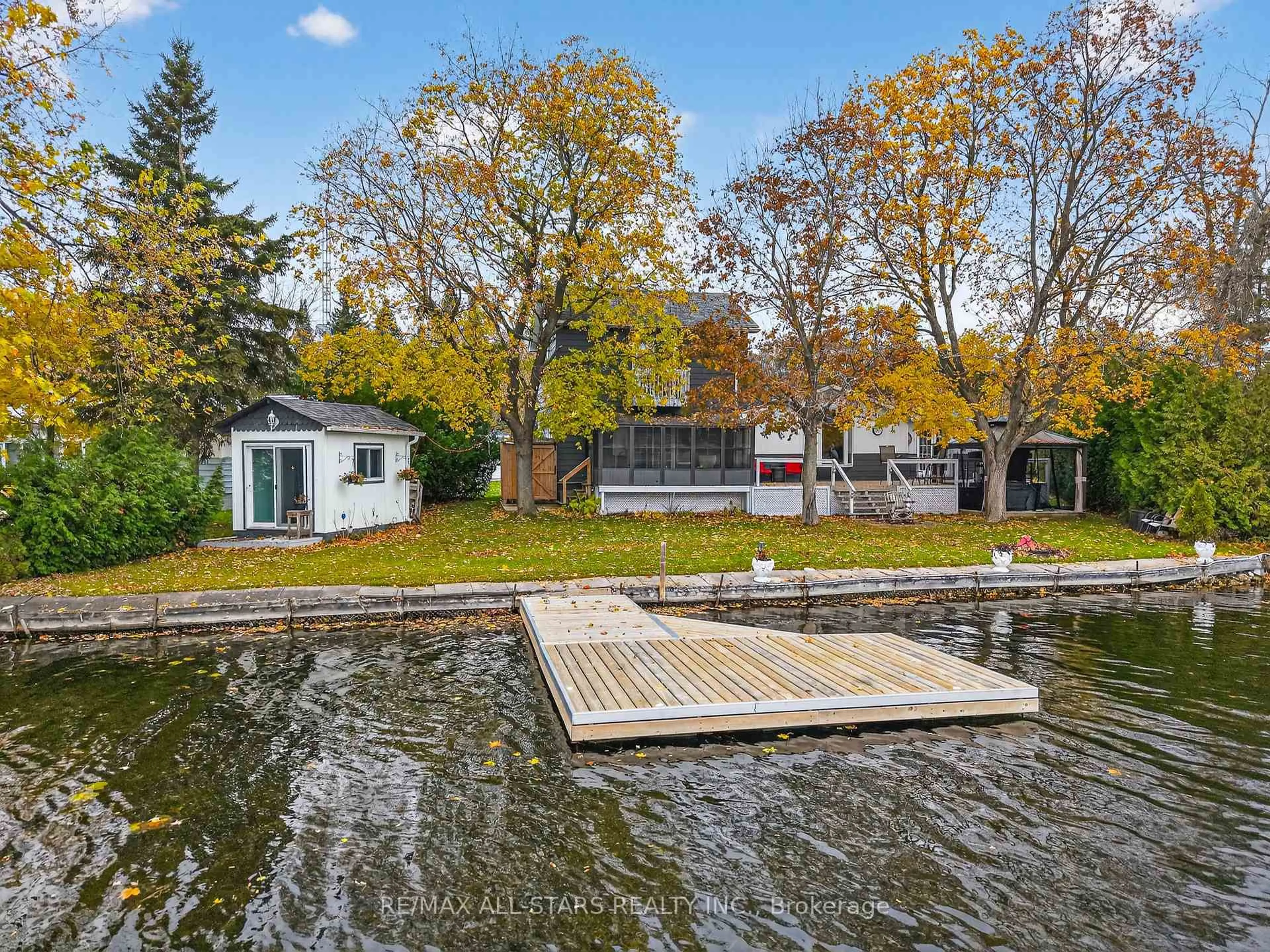 A pic from outside/outdoor area/front of a property/back of a property/a pic from drone, water/lake/river/ocean view for 19 Charlotte Cres, Kawartha Lakes Ontario K0L 2W0