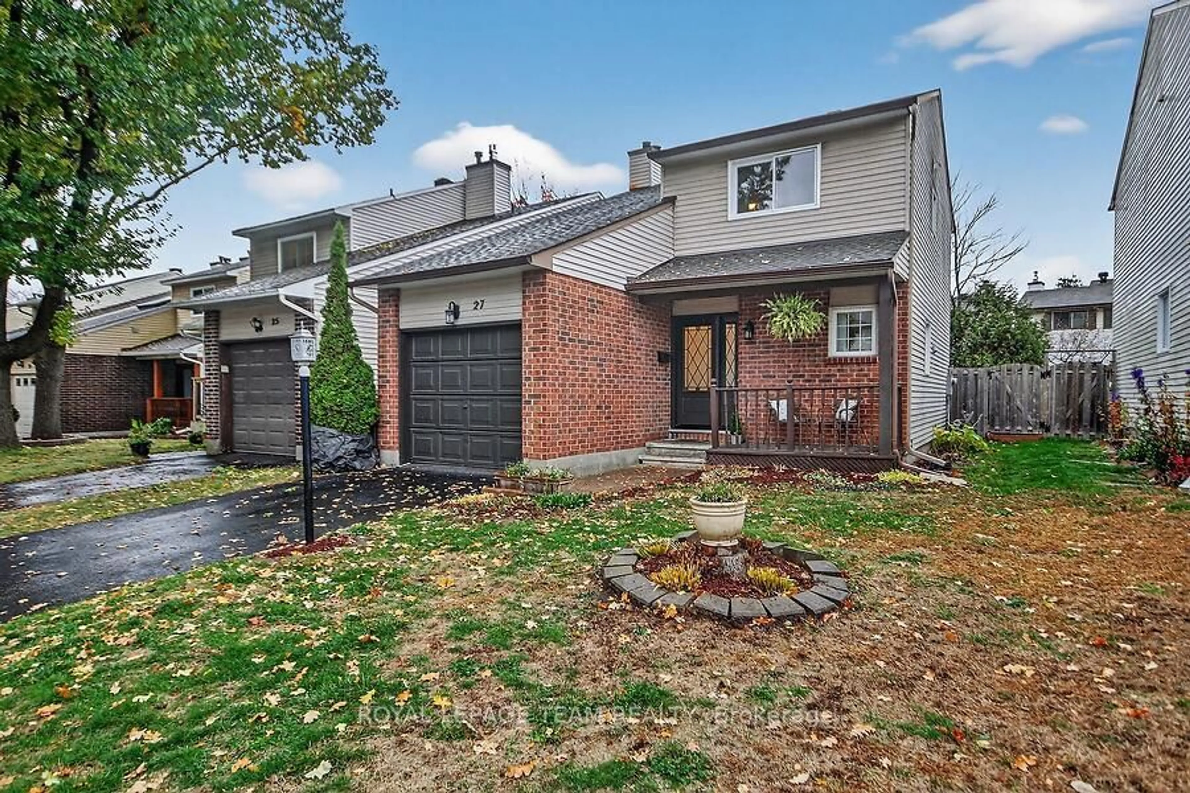 Home with brick exterior material, street for 27 Benlark Rd, Barrhaven Ontario K2J 2L5