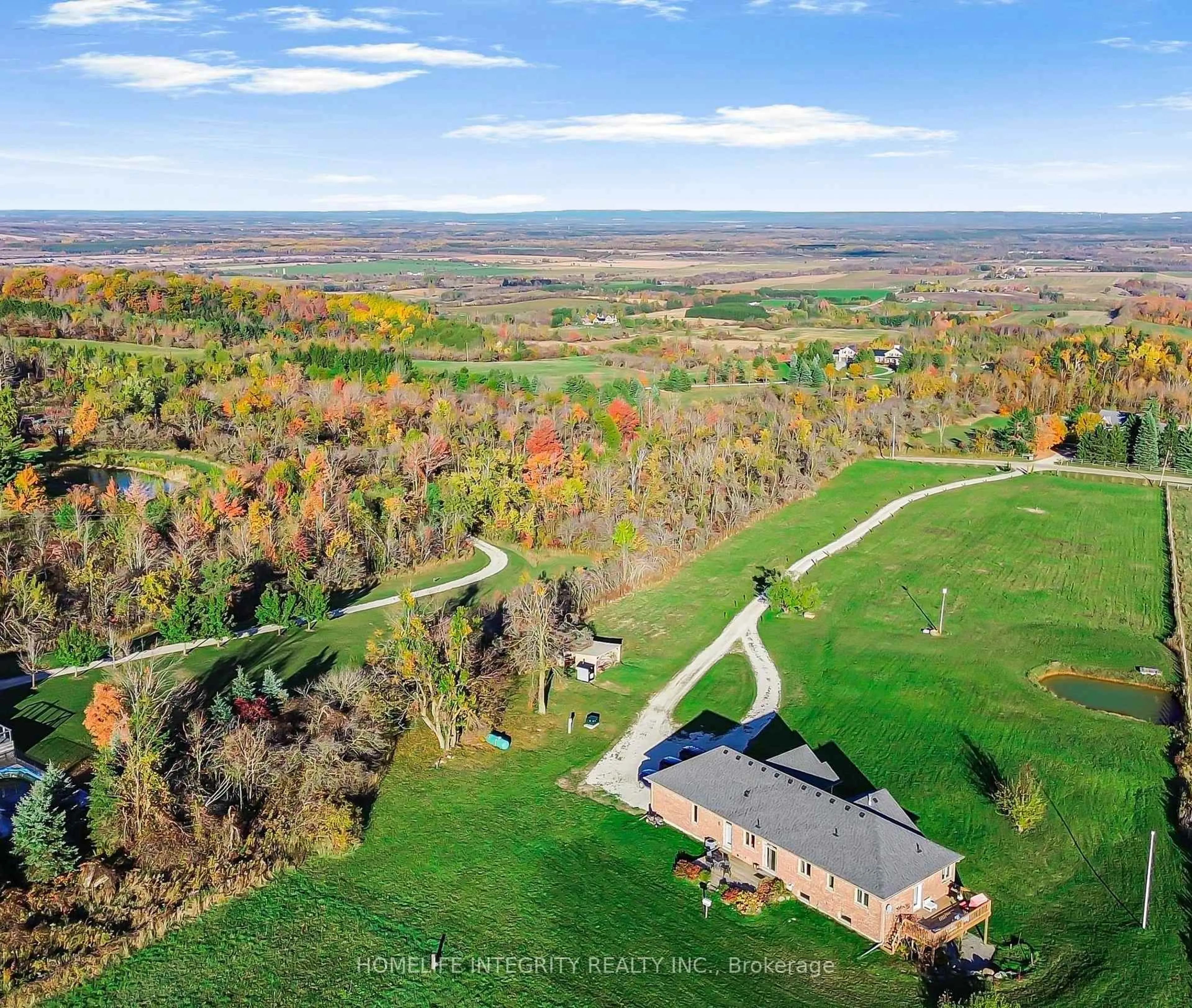 A pic from outside/outdoor area/front of a property/back of a property/a pic from drone, unknown for 838722 4th Line, Mulmur Ontario L9V 0J7